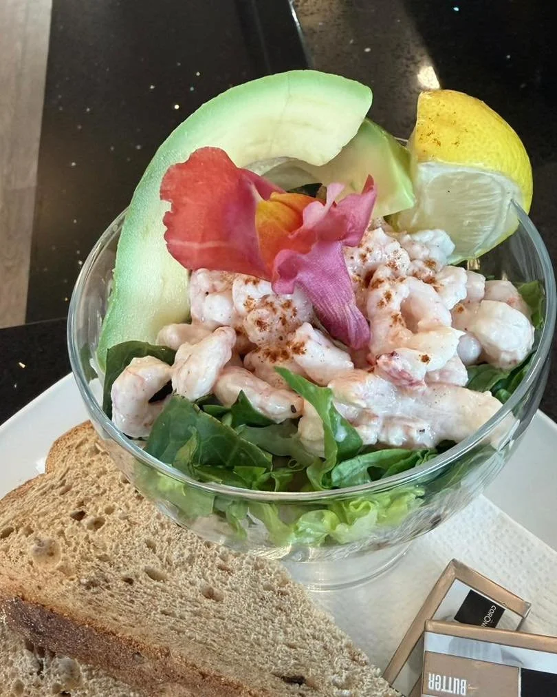 Classic prawn cocktail served with crispy lettuce, sliced avocado, brown bread and a lemon wedge &pound;9.95 in Seasons tomorrow from 12 noon.