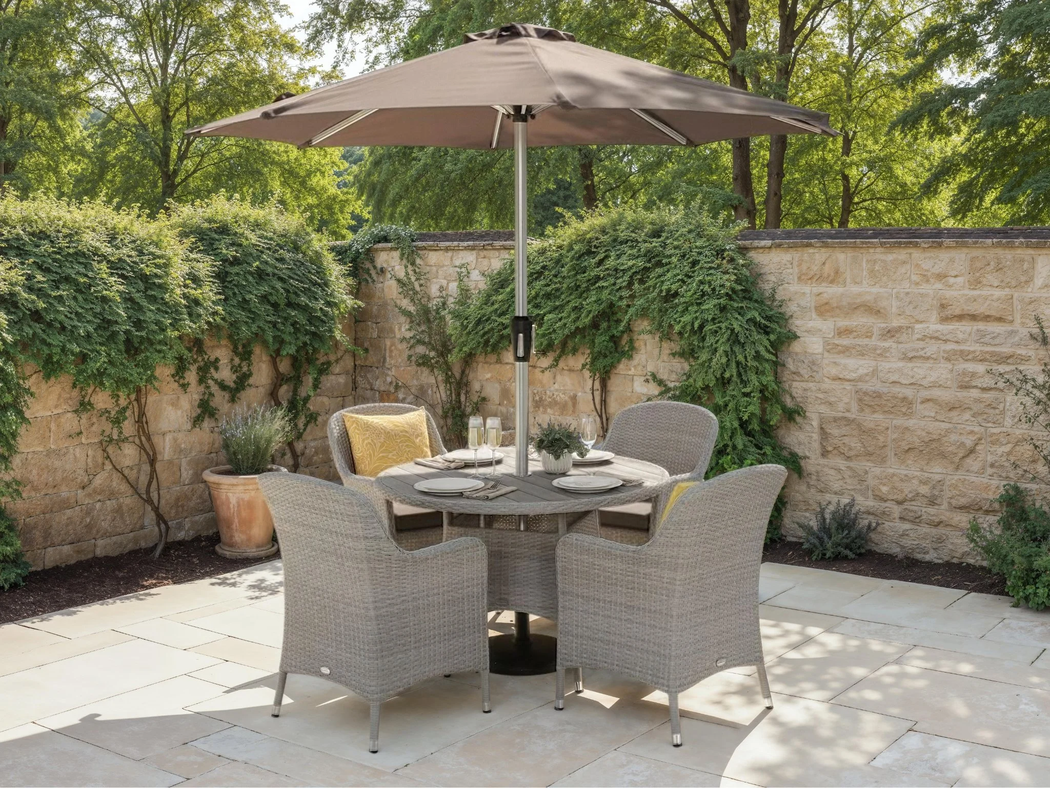 Bramblecrest Tetbury 110cm Tree-free Round Table with 4 Armchairs, Parasol & Base in Graphite