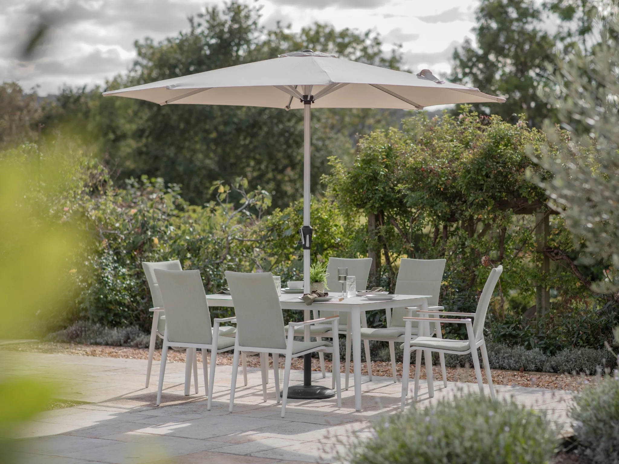 Bramblecrest Sofia 165 x 95cm Rectangle Table with 6 Deluxe Armchairs, Parasol and Base in Green