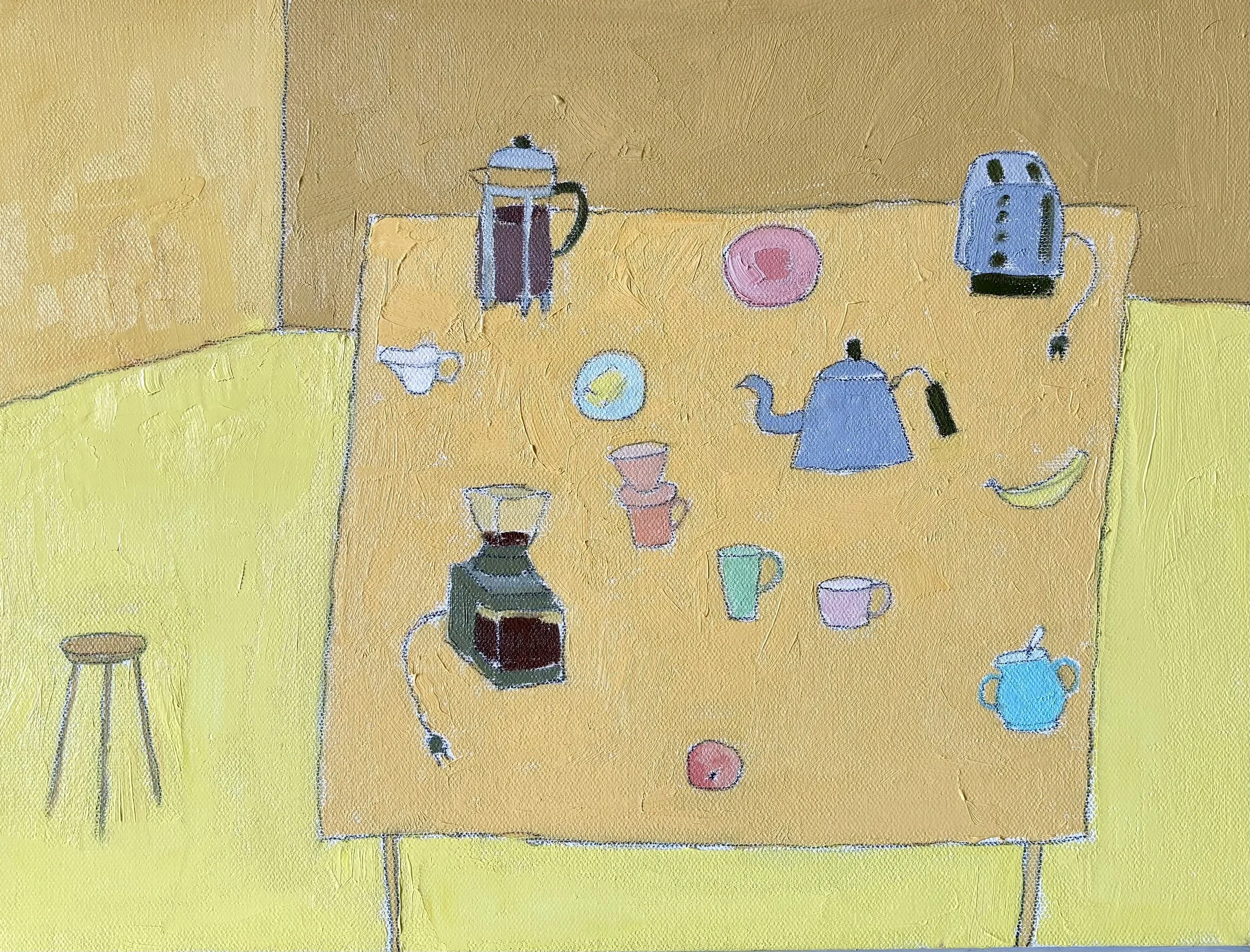 A yellow table with various kitchen items including a coffee pot, toaster, cups, a banana, and a coffee maker, set against yellow walls.