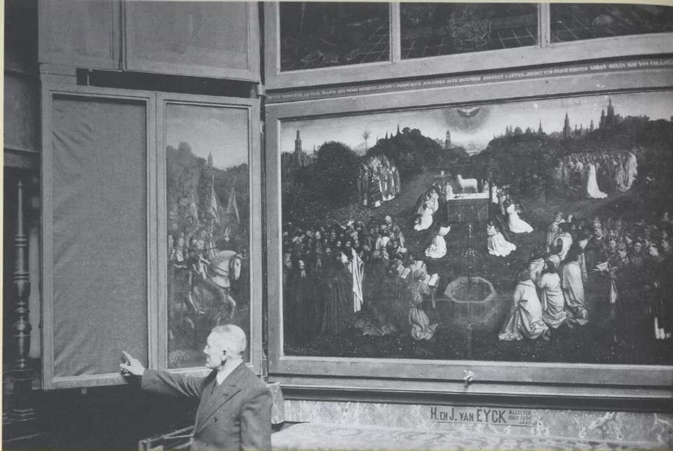 A photo from 1934 taken the morning of the discovery of the theft of the Righteous Judges panel from the altarpiece.
