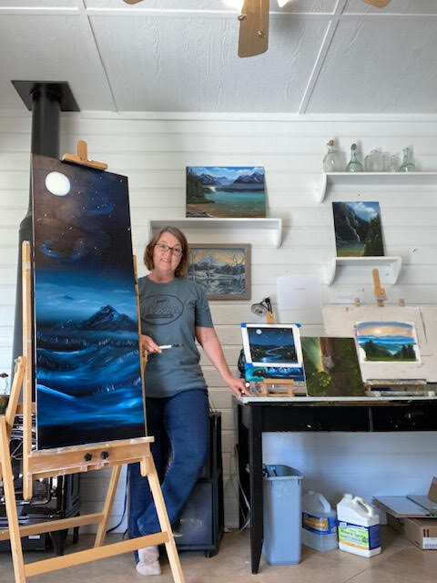 Lori in her current studio with some of her work