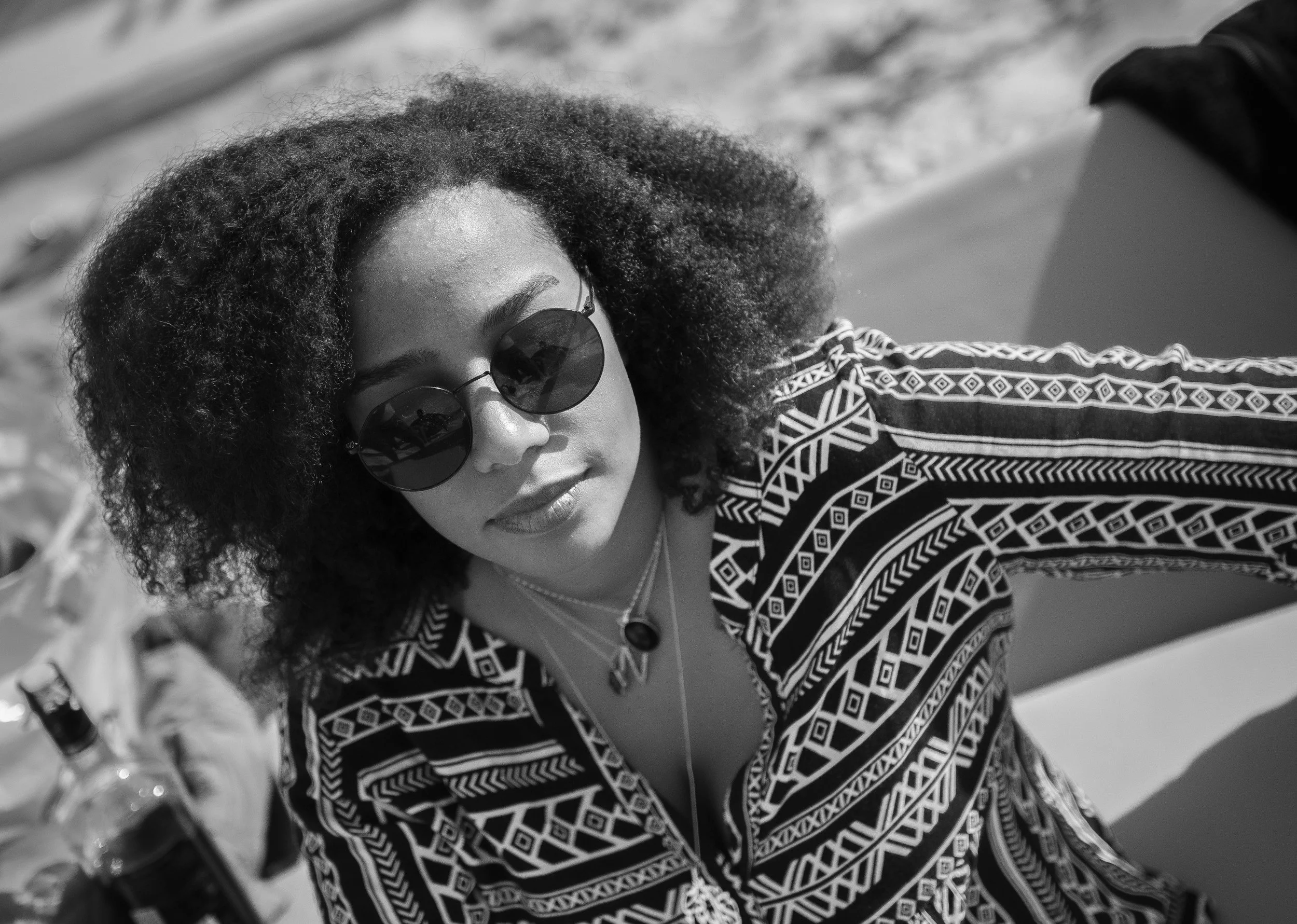 Frizz, Humidity & the Dallas Weather: How to Protect Your Curls Year Round