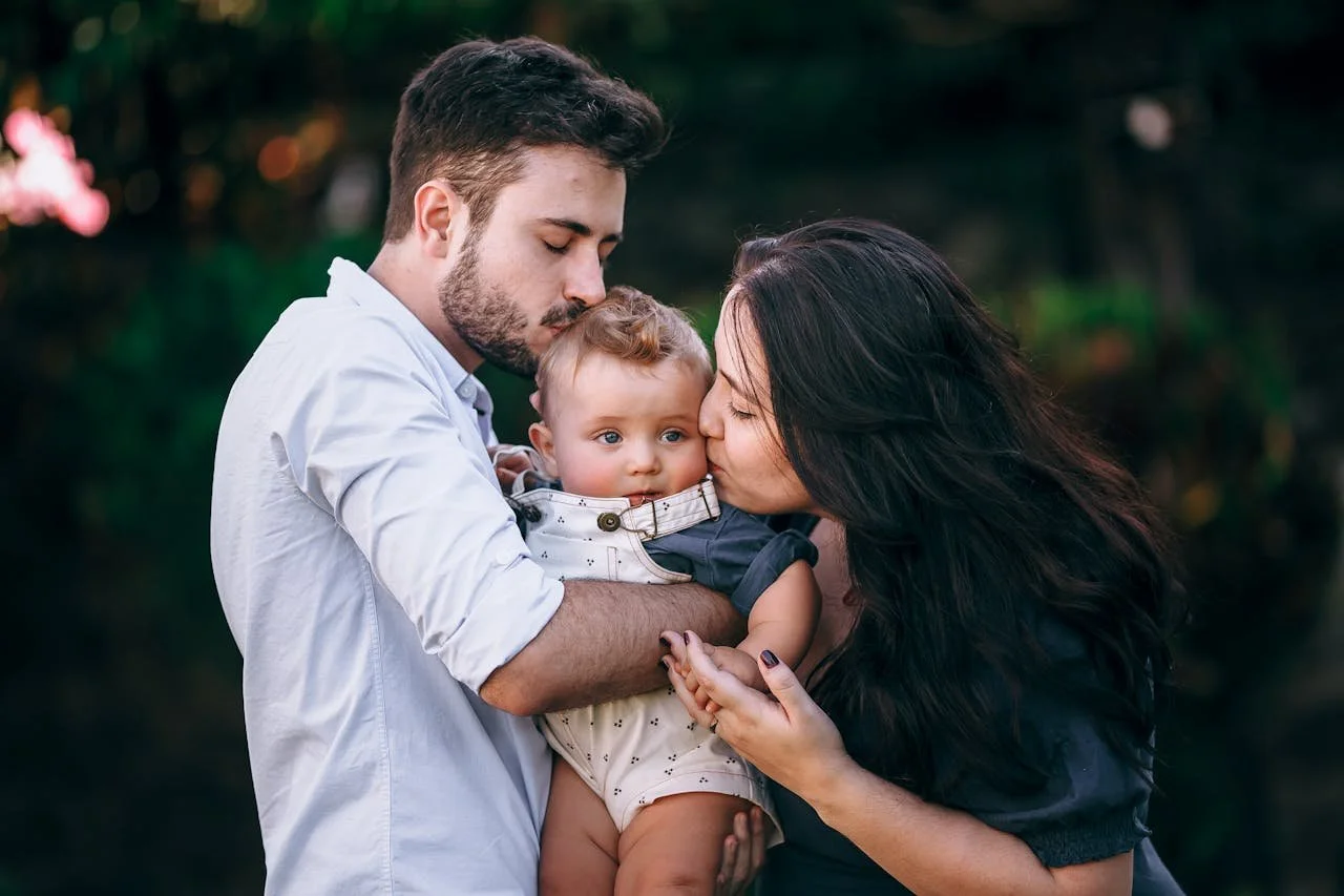 loving-family-embrace-in-outdoor-setting