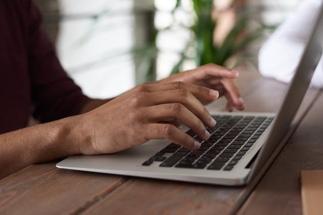 person-using-macbook