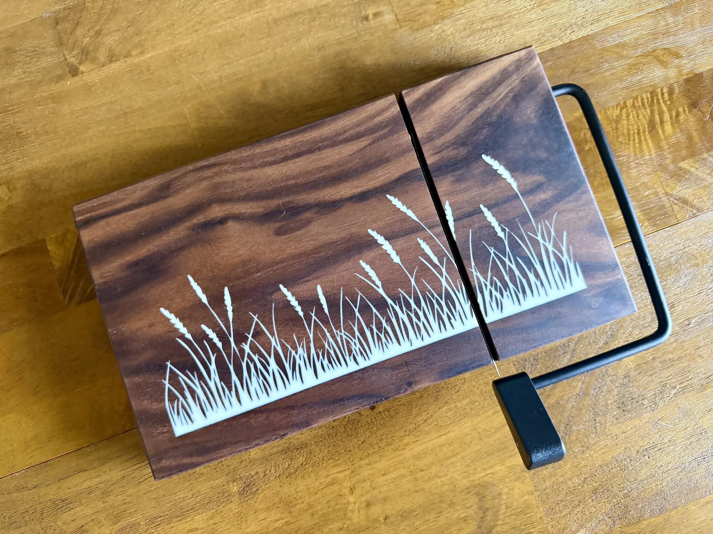 Walnut Cheese Slicer with White Epoxy Grass Silhouette