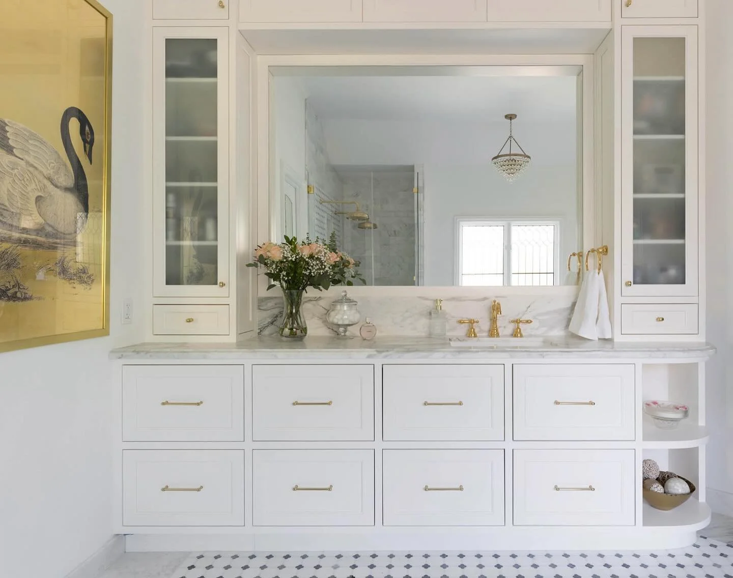 When designing storage, I focus on maximizing space and incorporating versatile organizers for enhanced functionality. This bathroom vanity, for example, blends practicality and elegance&mdash;perfect for a productive and poised woman, making her dai
