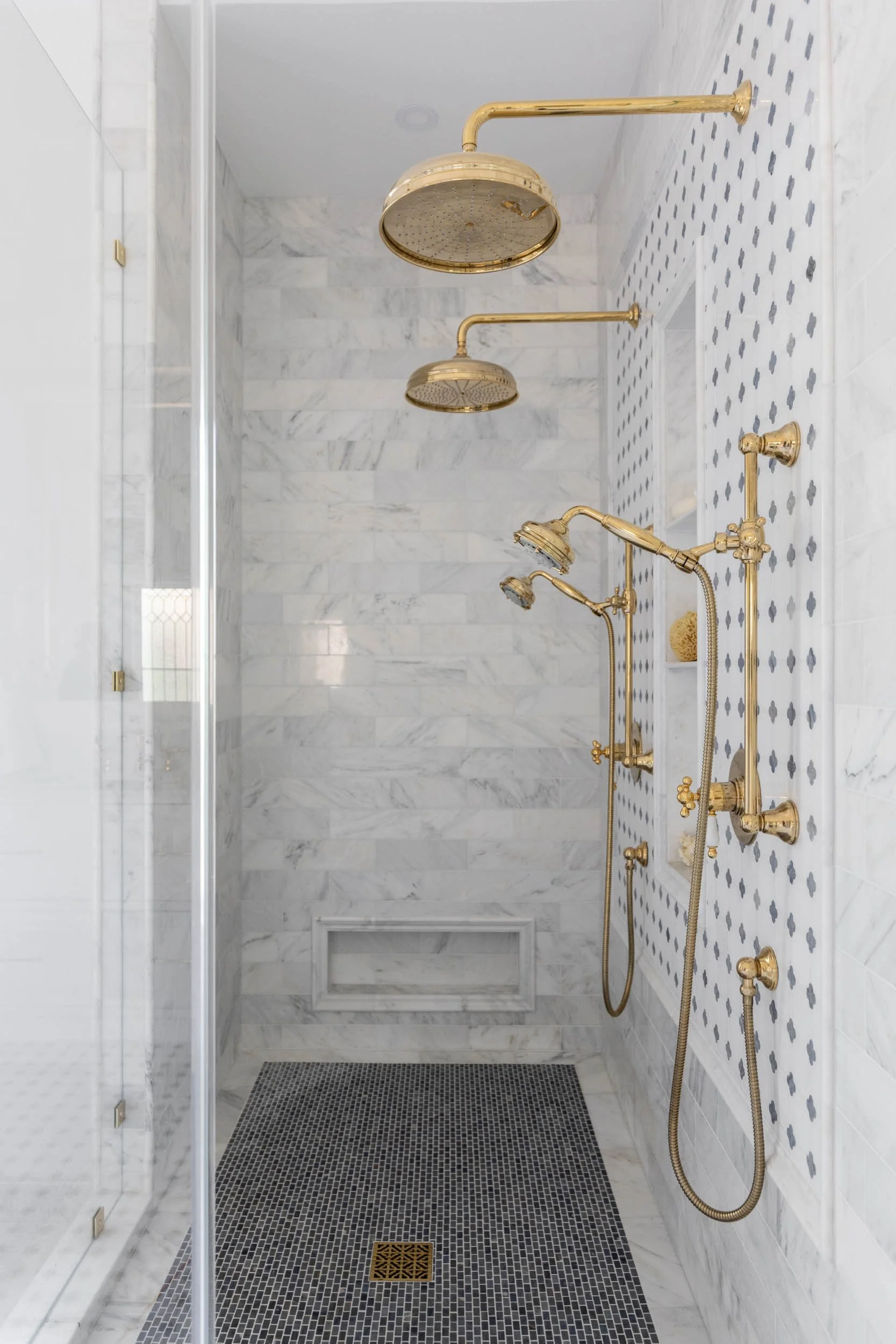 Double side by side shower with gold finish shower set Azul marble floor and mosaic bath marble