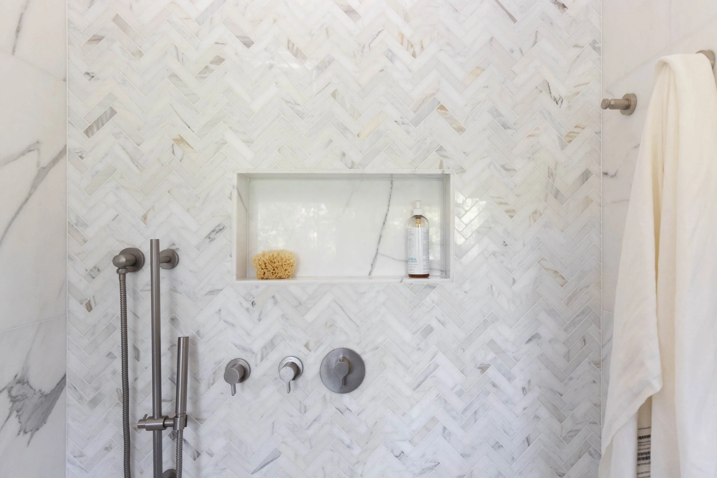 Shower niche with whole piece of marble