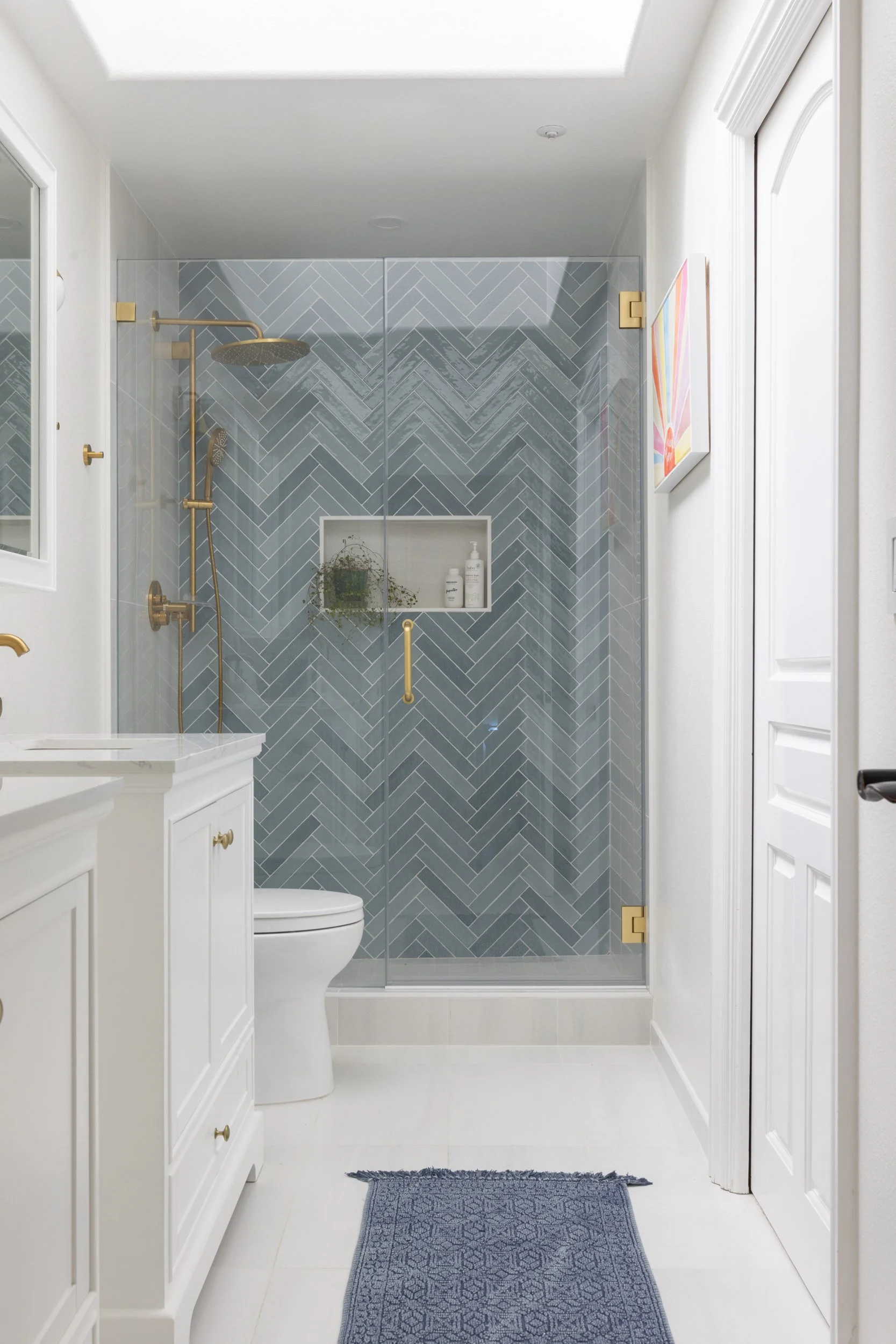 Herringbone-tile-walk-in-shower-bathroom.jpg