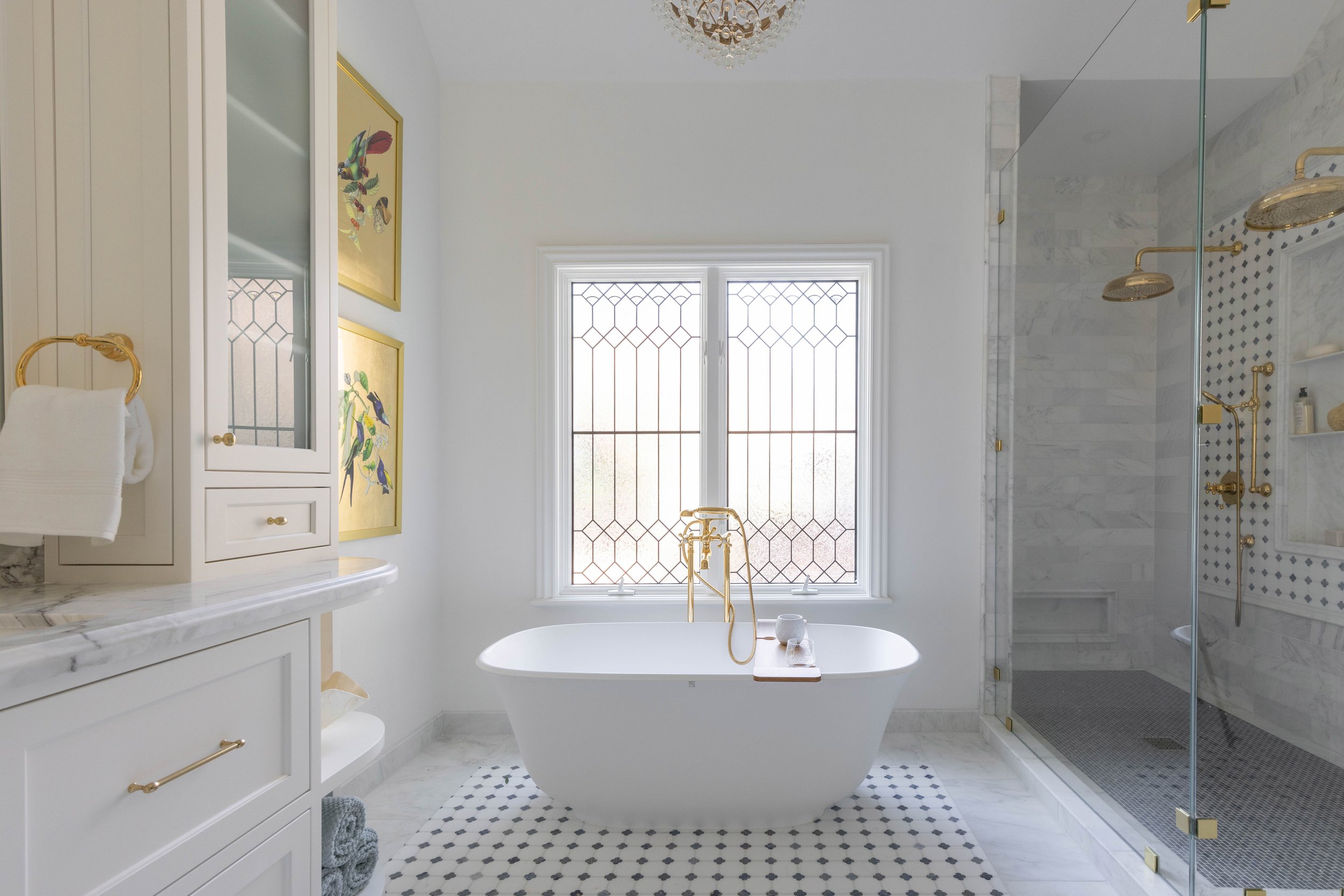 Primary bathroom renovation with freestanding tub and leaded glass window — Ruby Hill, Pleasanton by Studioayse