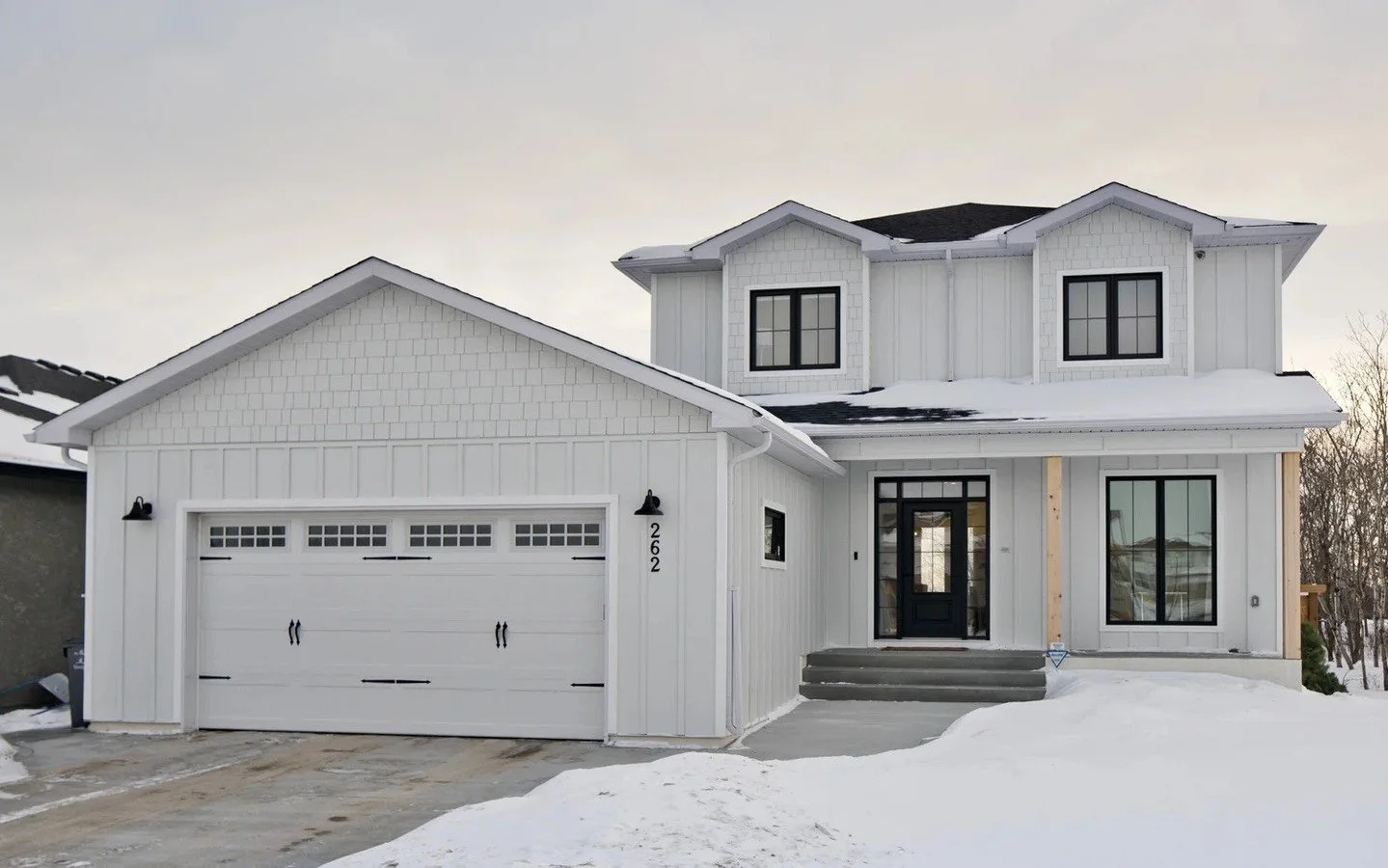 The front door: where &lsquo;home&rsquo; begins and &lsquo;welcome home&rsquo; feels a little extra special. ✨🚪⁠
⁠
First impressions matter, and ours begin right at the front door. ⁠
⁠
#welcomehome #customhomes #customhomewinnipeg #customhomebuilder