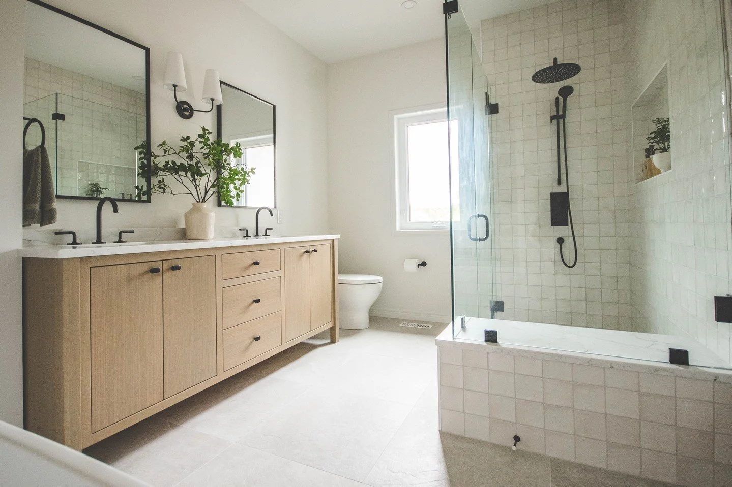 Project Wallace ✨ ⁠
⁠
Grounded elements, rich textures, and warm wood accents bring a truly homey feel to every corner. ⁠
⁠
From the prep kitchen tucked off the main space to the three beautiful bathrooms, luxury and livability come together seamless