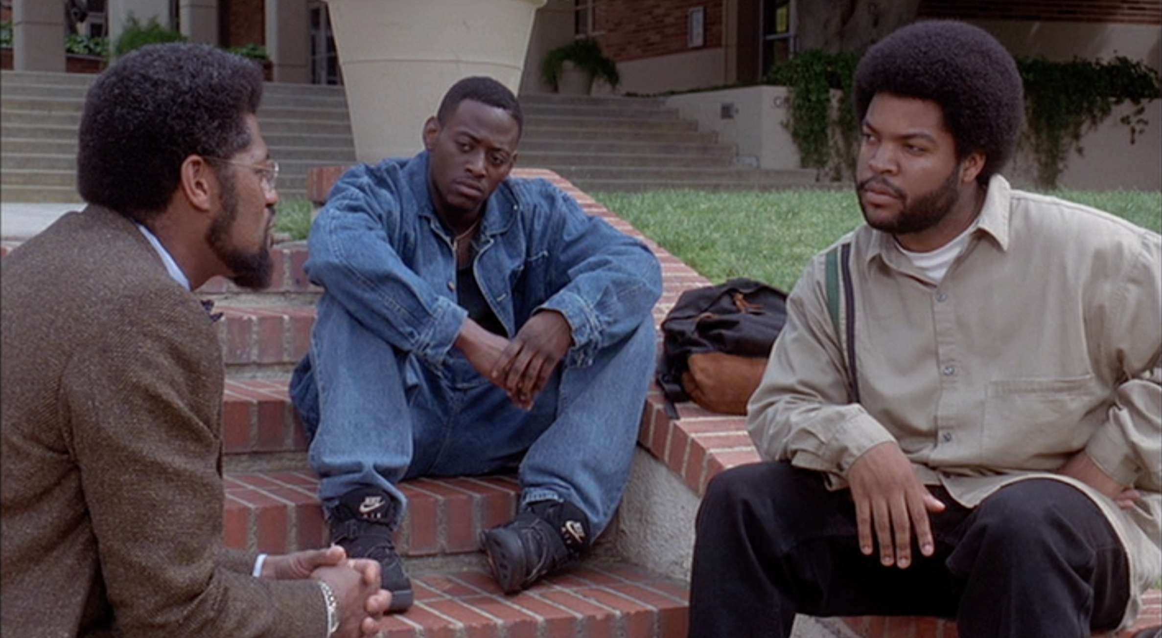 Professor Phipps (Laurence Fishburne) gets into it with Malik (Omar Epps) and Fudge (Ice Cub) in Singleton’s college ensemble piece.