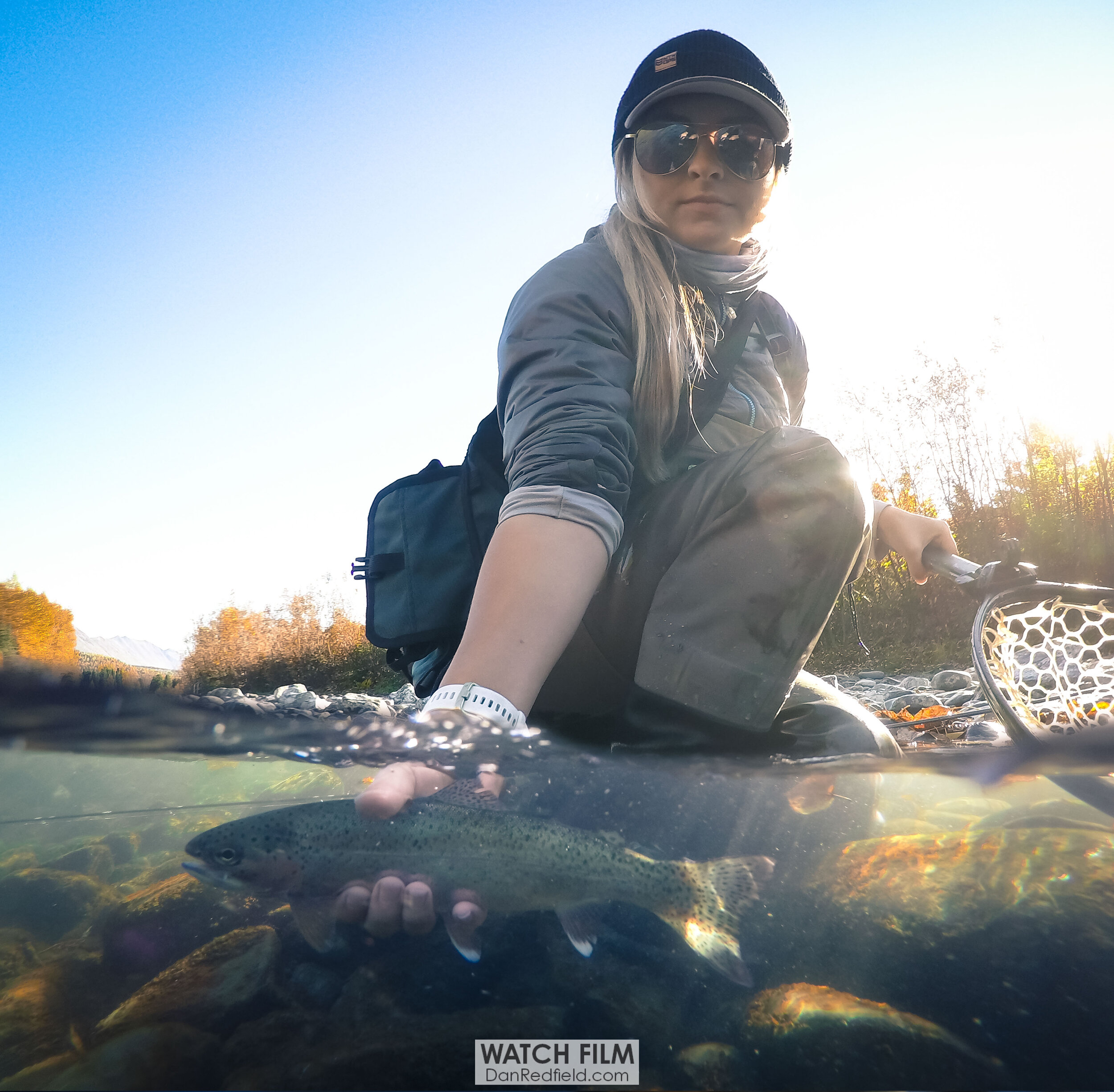 Tessa shetter holding rainbow trout.jpg