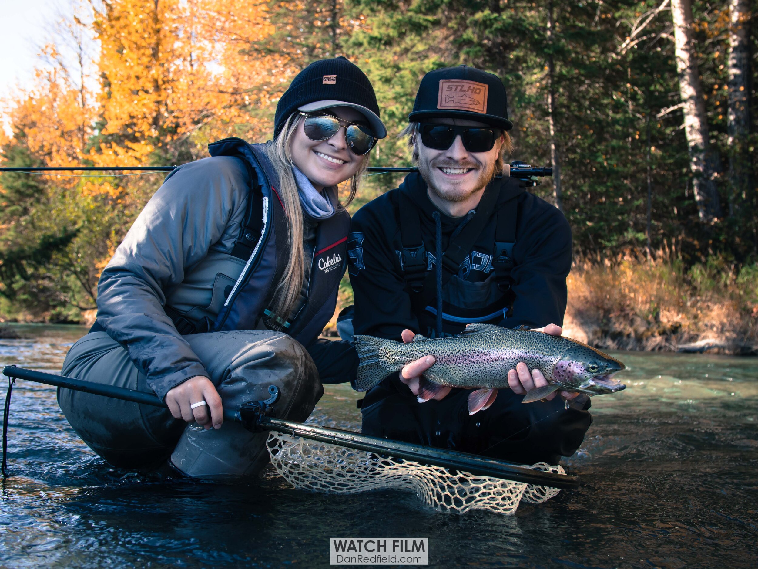 tessa shetter and Kory Robbins holding rainbow trout on kenai river.jpg