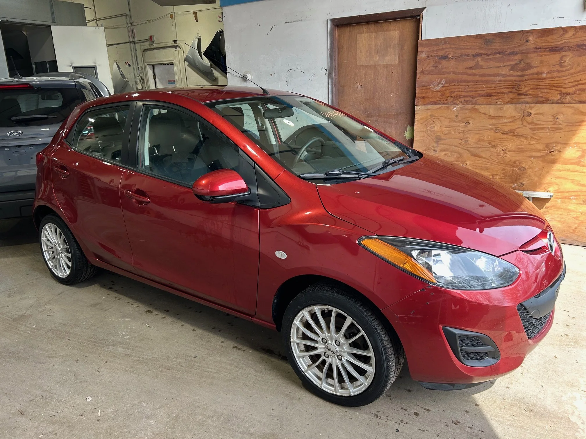 2014 MAZDA 2 HATCHBACK, MANUAL TRANS, ONLY 67K MILES ! A/C IS FREEZING COLD (THESE OLDER  HONDAS, TOYOTAS, AND MAZDAS ARE HIGHLY PRIZED BECAUSE THEY LAST FOREVER. JUST TRY TO FIND A LO MILEAGE ONE !!