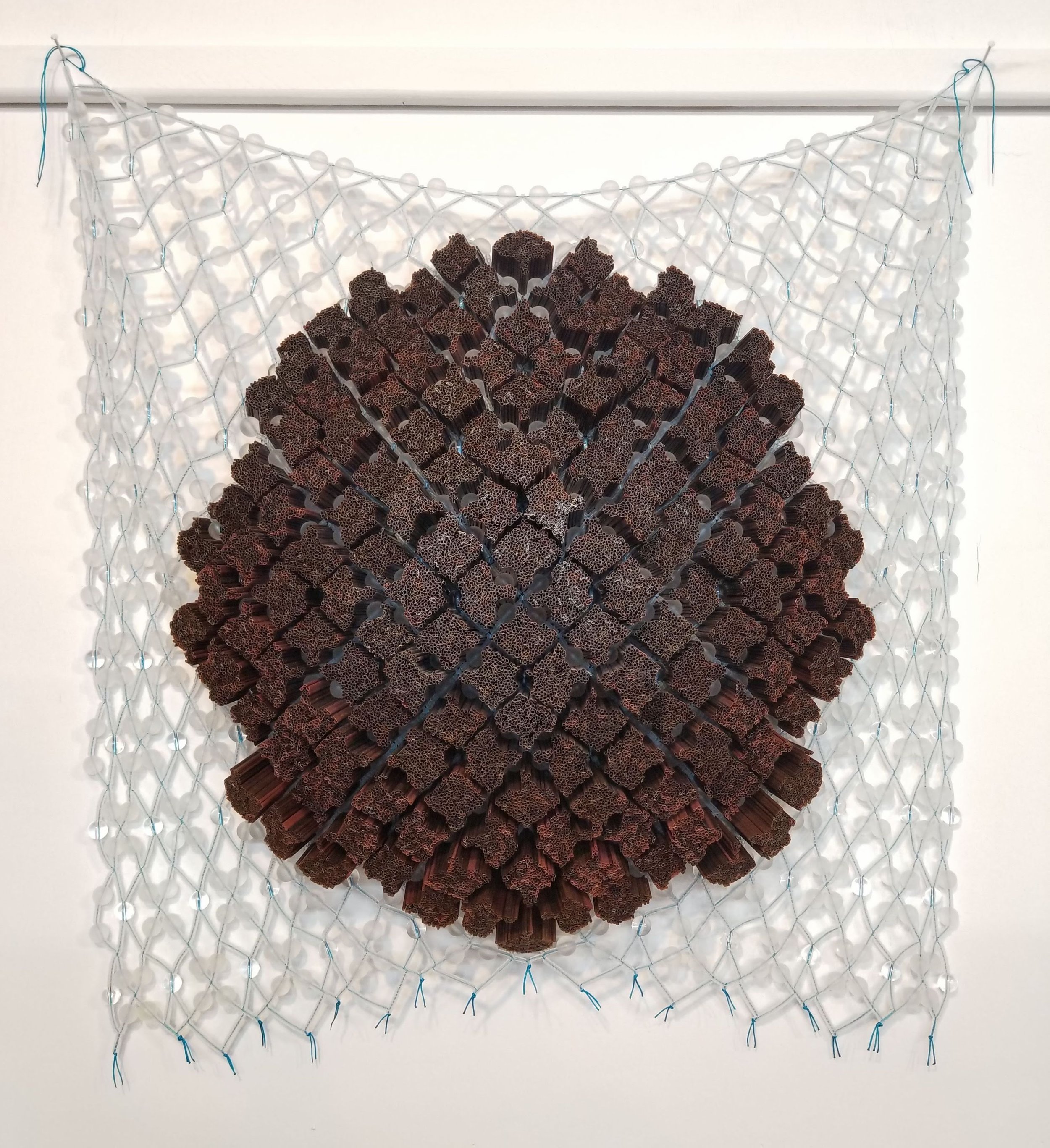 Hanging sculpture with mixed media