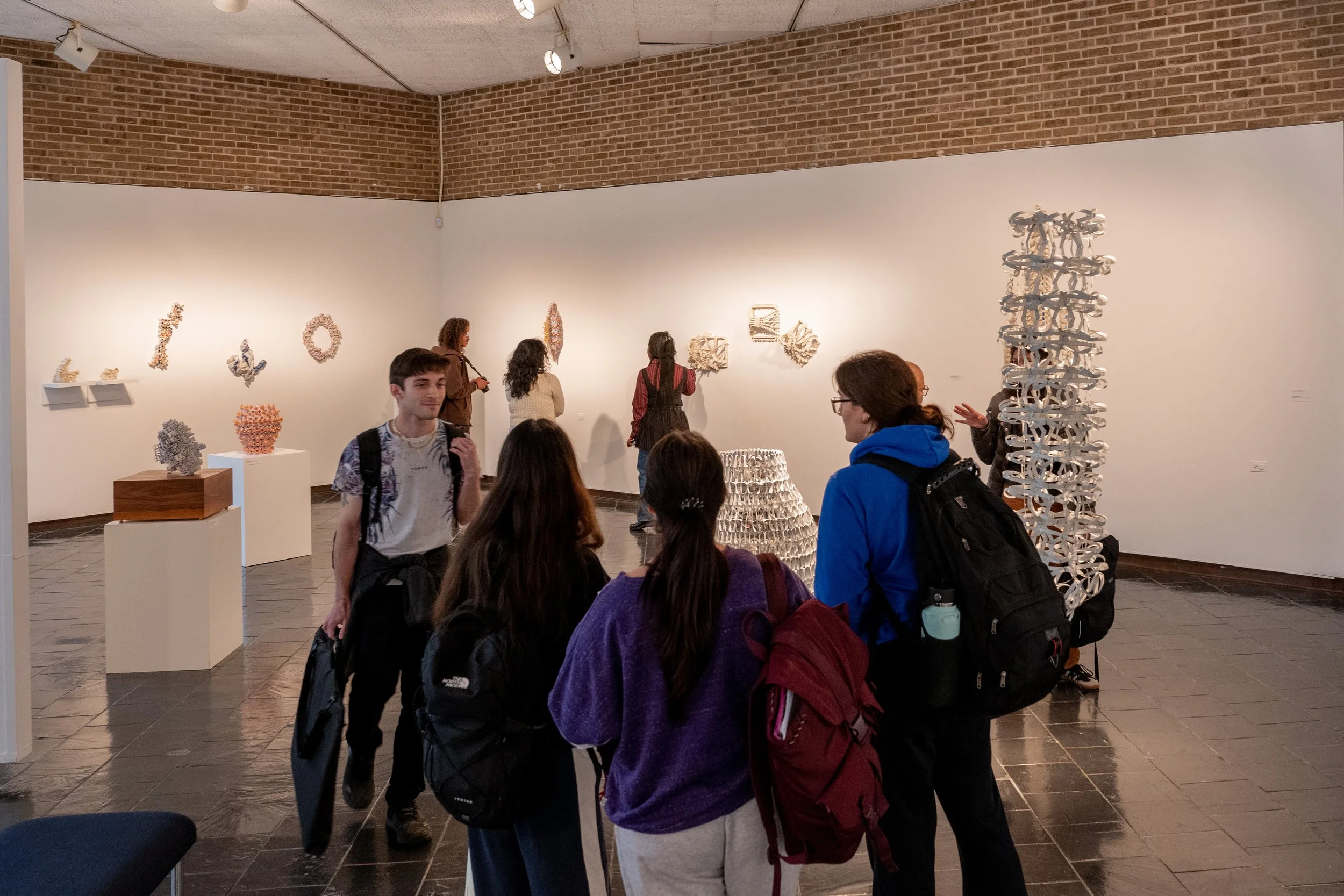 Students gathering at Kate Rusek Opening