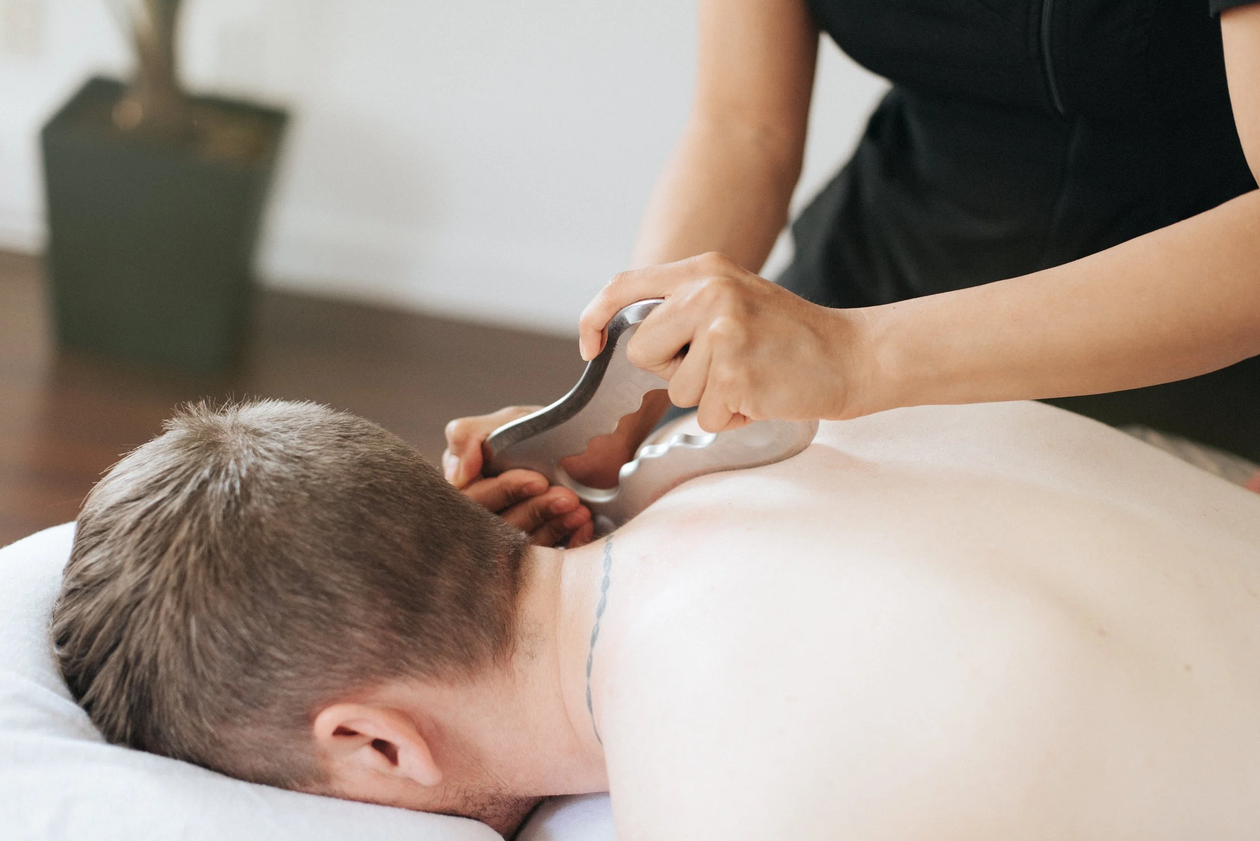 Registered massage therapy session at Micro Wellness to improve circulation and relieve muscle tightness