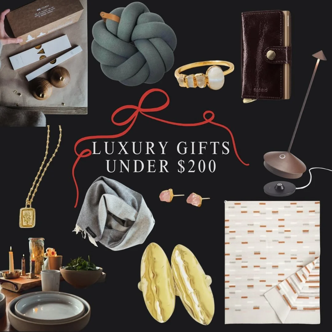 The things that feel ever so fancy but won&rsquo;t break the bank. 
1. Candle Lovers Gift Set-$150
2. Blossom Knot Cushion in Grey-$98
3. Moonstone Ring-$150
4. Naplak Premium Wallet in Mahogany-$155
5. Forget me Not Necklace-$140
6. Lambswool Revers