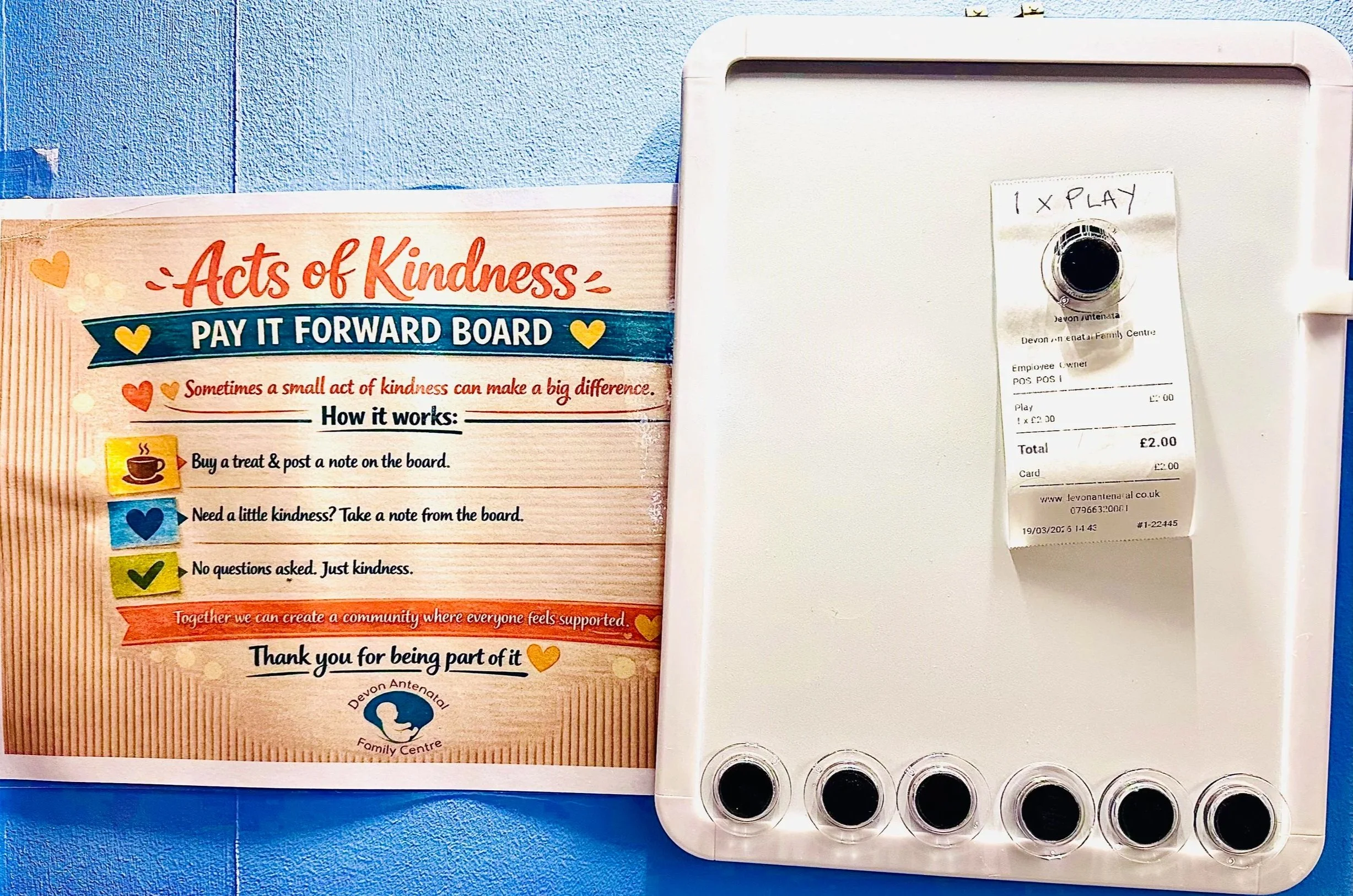 Kindness board at Devon Antenatal Family Centre where families can take a gifted play session, drink or treat