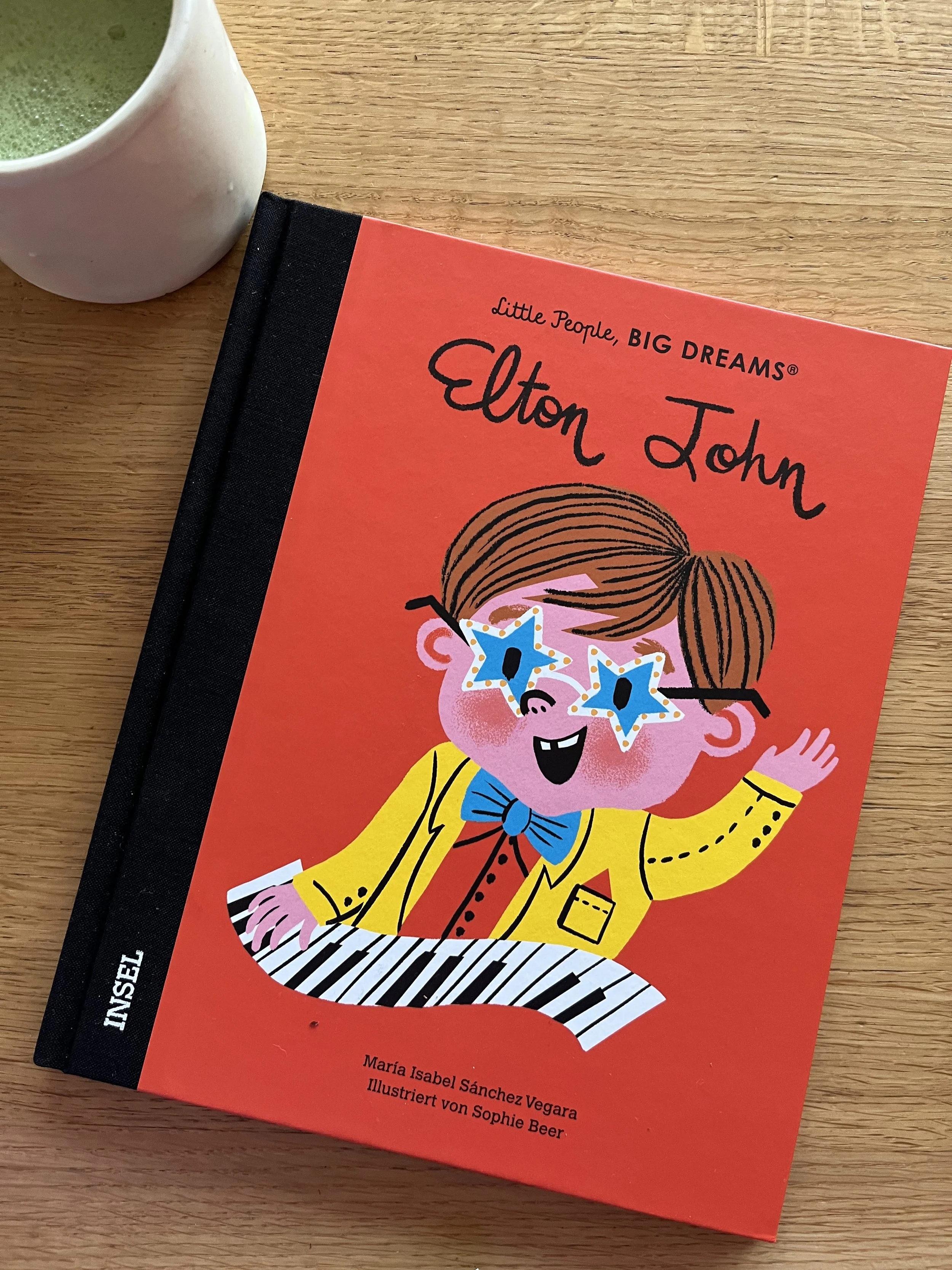 Heller Stern mit Federboa