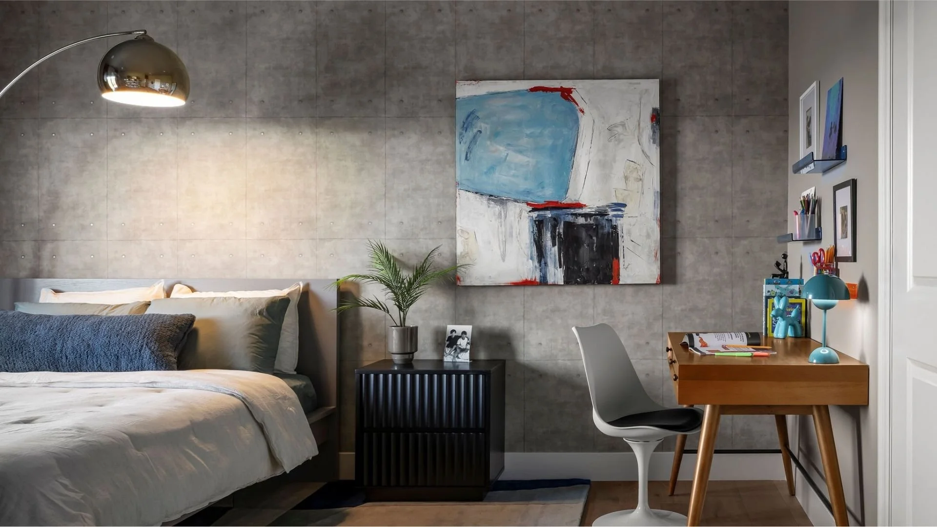 Living room with a gray bar cabinet, four round modern chairs, a round coffee table with flowers, a golden chandelier, and curtains on windows, in a bright and neutral color palette.