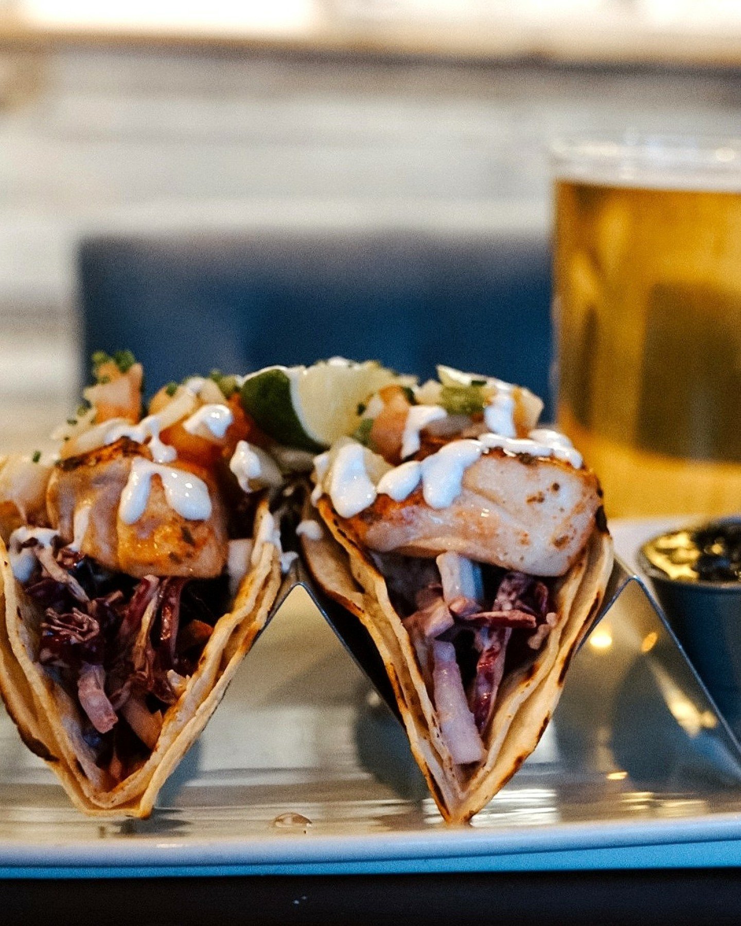 It's Tuesday... did someone say TACOS? 🌮

Now prepared with fresh pan seared cod, bib lettuce, cabbage, crema, pico de gallo and crispy corn tortillas &mdash; 100% gluten free &amp; delicious.

Taco fans, come get your #tacotuesday fix tonight!
 
 
