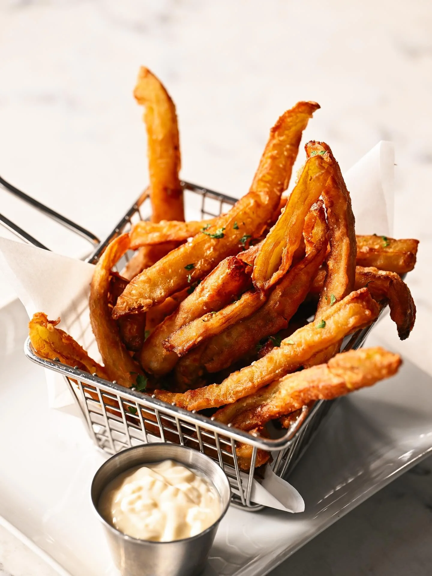 You know that perfect after-work window when you&rsquo;re not ready for dinner but definitely need a snack and a drink? That&rsquo;s for the Early Bar Menu!

Start with the Eggplant Fries: lightly battered, golden, and made for dipping in our lemon a