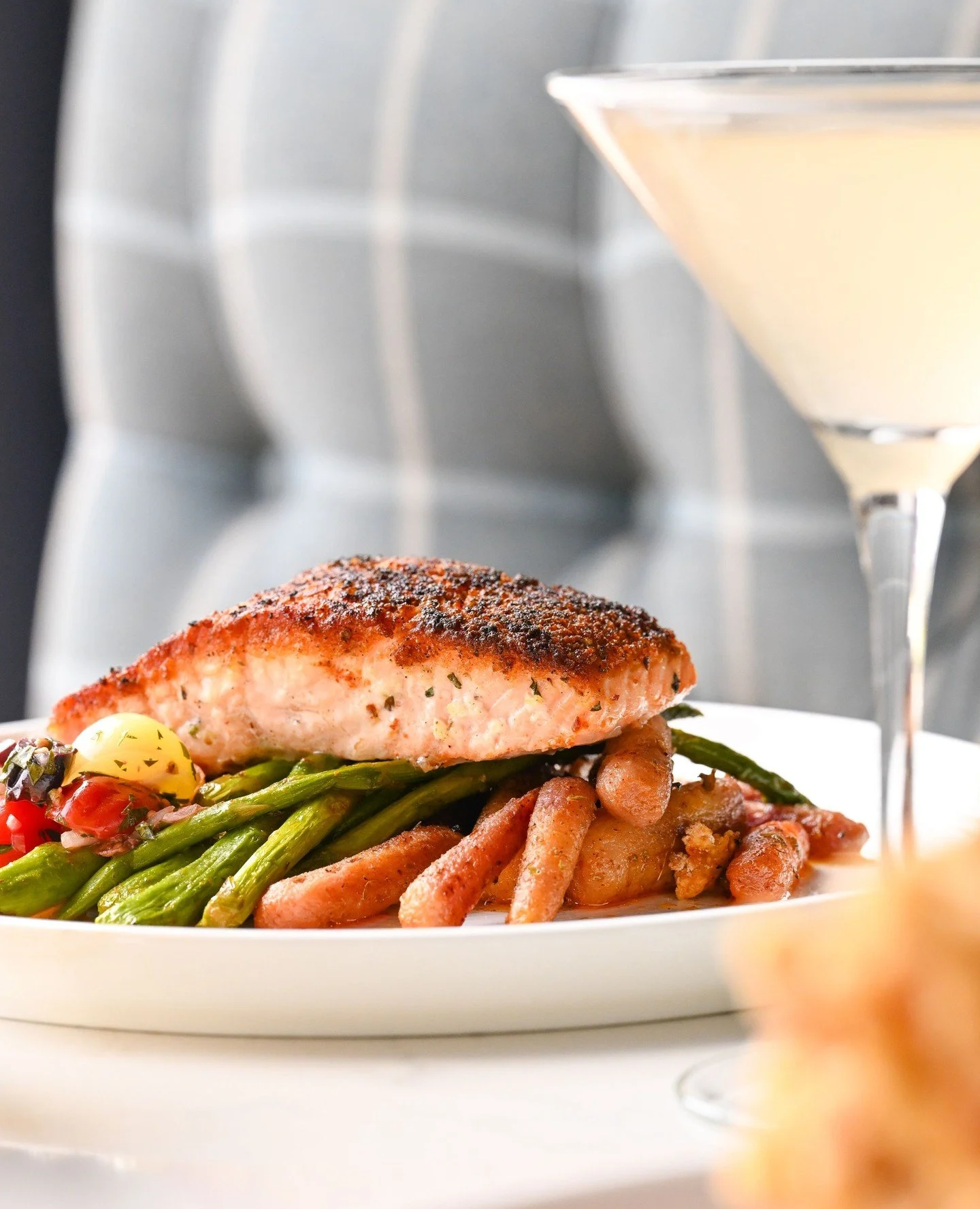 A dish that makes everyone at the table say, &lsquo;Wait&hellip; what did you get?&rsquo; The Faroe Island Salmon sports a golden herb crust, layered with roasted veggies, tomato relish, and finished with lemon-dill yogurt sauce.⁠
⁠
Catch it while it