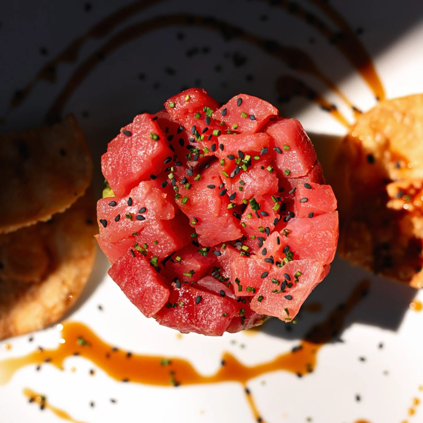 It might be sweater weather, but we&rsquo;re still serving summer-level freshness. 🐟✨⁠
⁠
Our Tuna Poke Stack is the kind of dish that reminds you why even in November the fish is freshest on our side of the coast - layers of sushi rice, ponzu, eel s