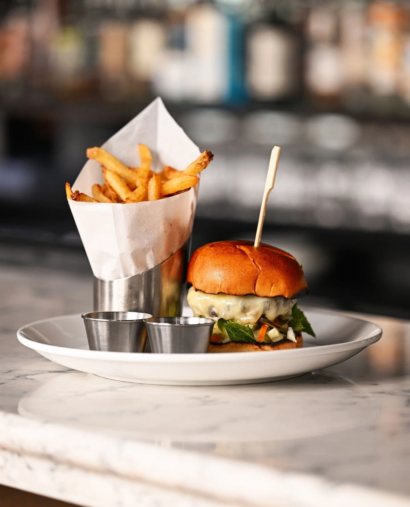 Your Early Bar Menu order says a lot about the kind of evening you&rsquo;re setting up for. Maybe it starts a Caesar that's crisp and classic. Maybe it&rsquo;s the Smashburger, because nothing pairs with a bar seat quite like this. For some, it&rsquo