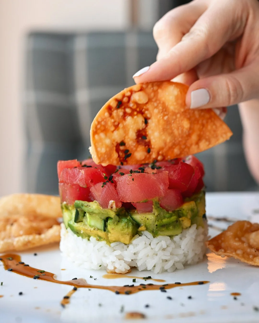 Tuna Poke Stack at The Poynt 🍣⁠
Layers of sushi rice, fresh tuna, and crispy fried wontons, drizzled with ponzu, eel sauce, and avocado vinaigrette. Light, vibrant, and utterly irresistible. [GF]