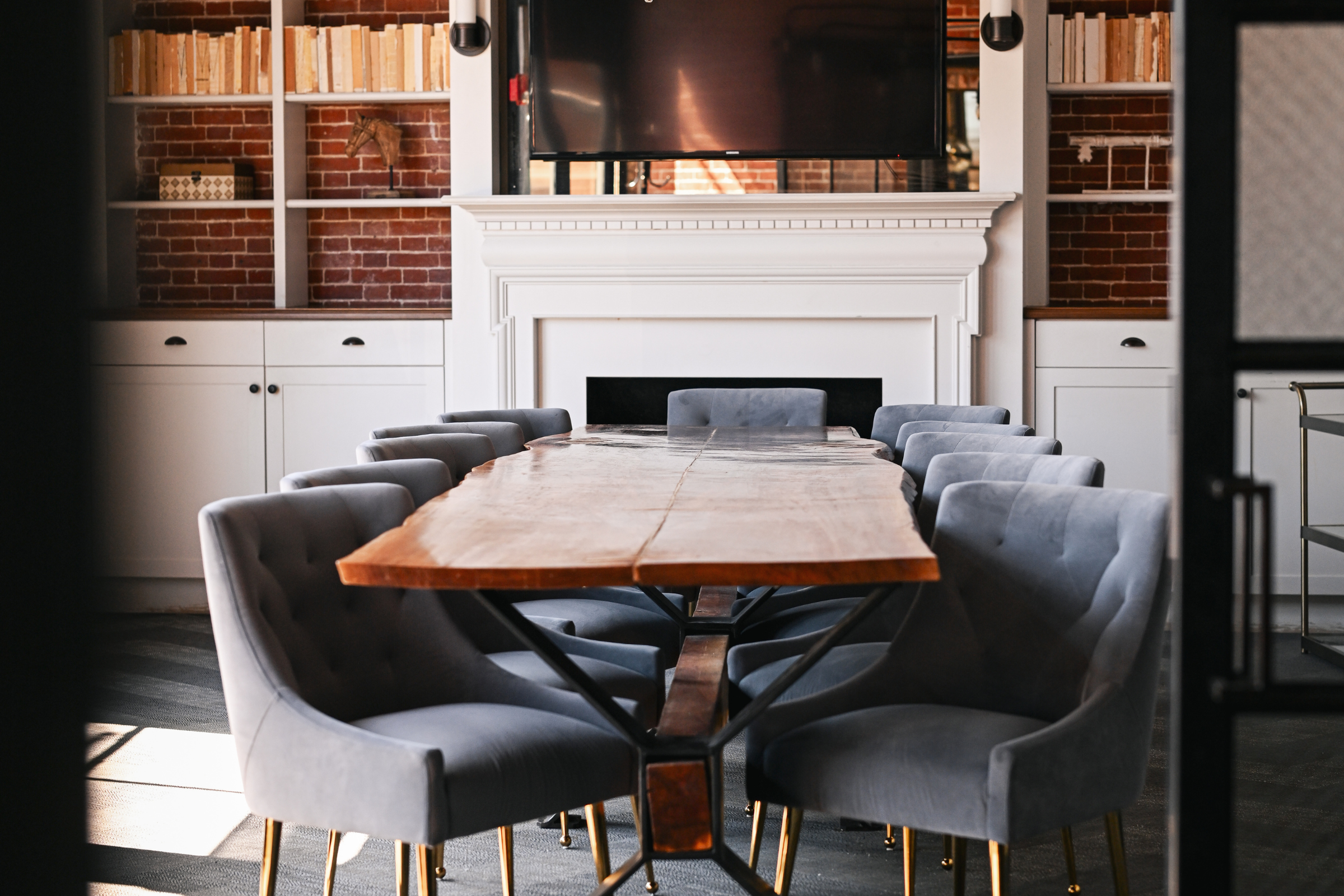 Private dining room with a live-edge table at The Poynt, Newburyport MA