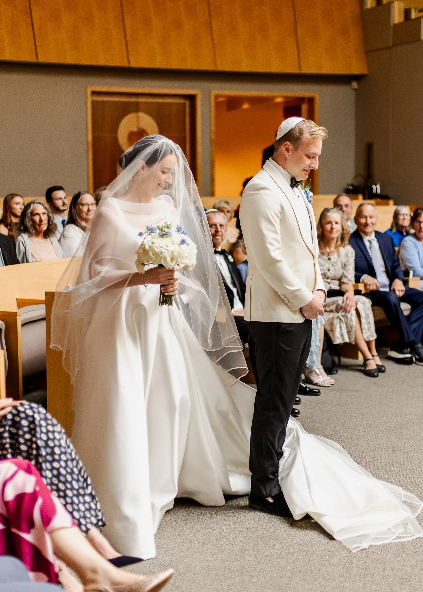 Sarah and Owen during their Jewish wedding ceremony at Temple Shir Shalom