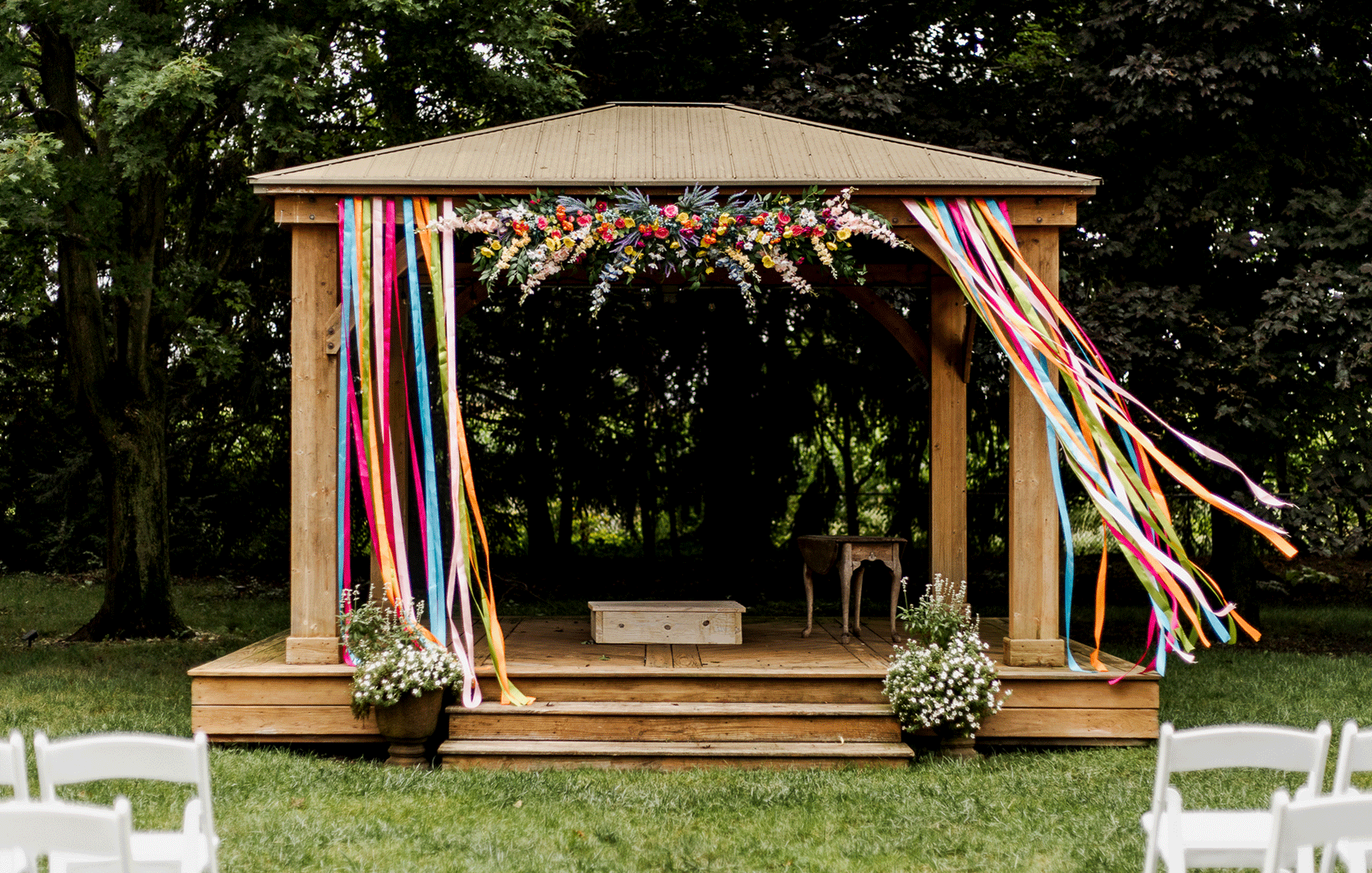Gif of gazebo ribbons blowing in the wind at Bloom and Bower ceremony site