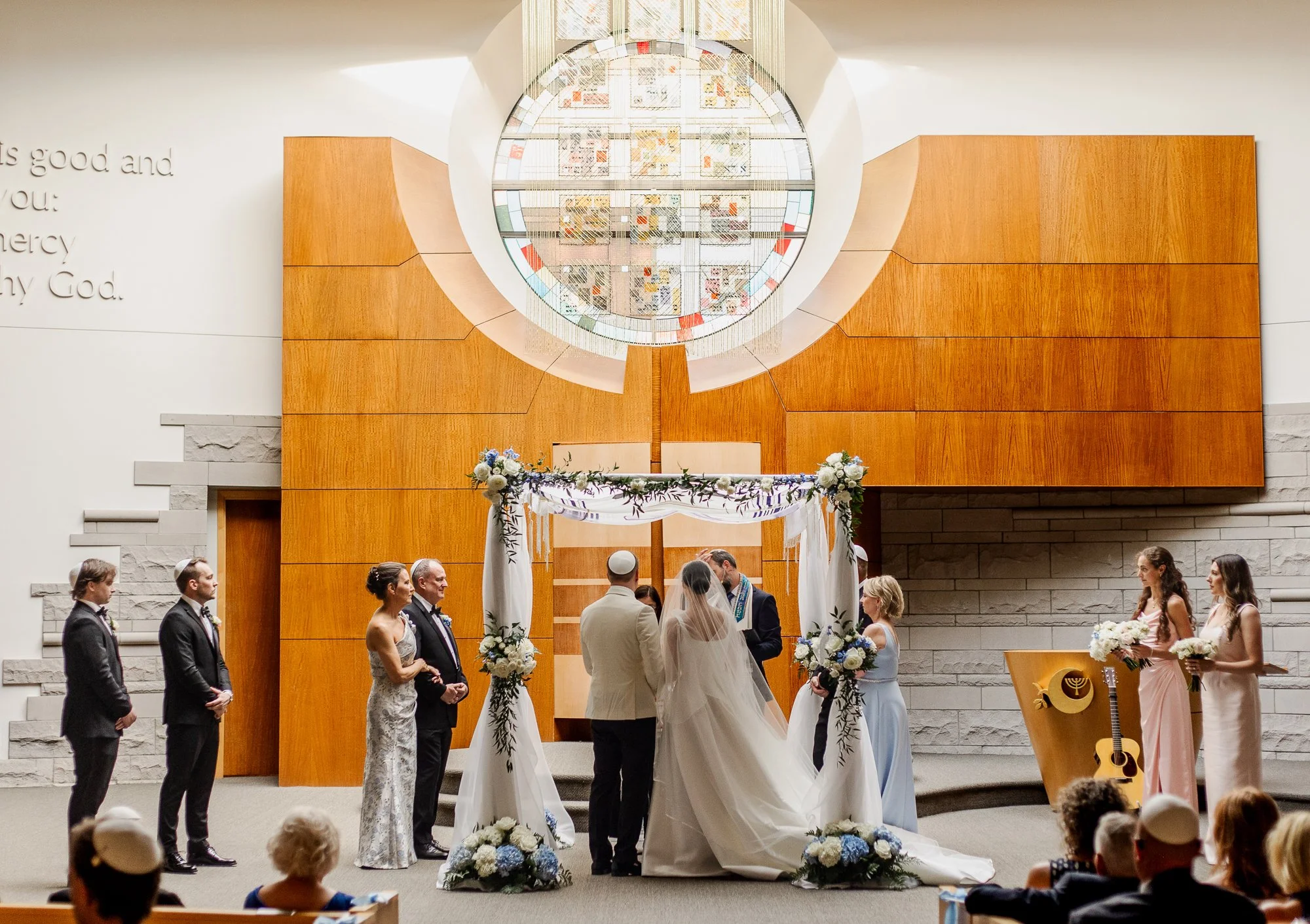 Sarah and Owen during their Jewish wedding ceremony at Temple Shir Shalom