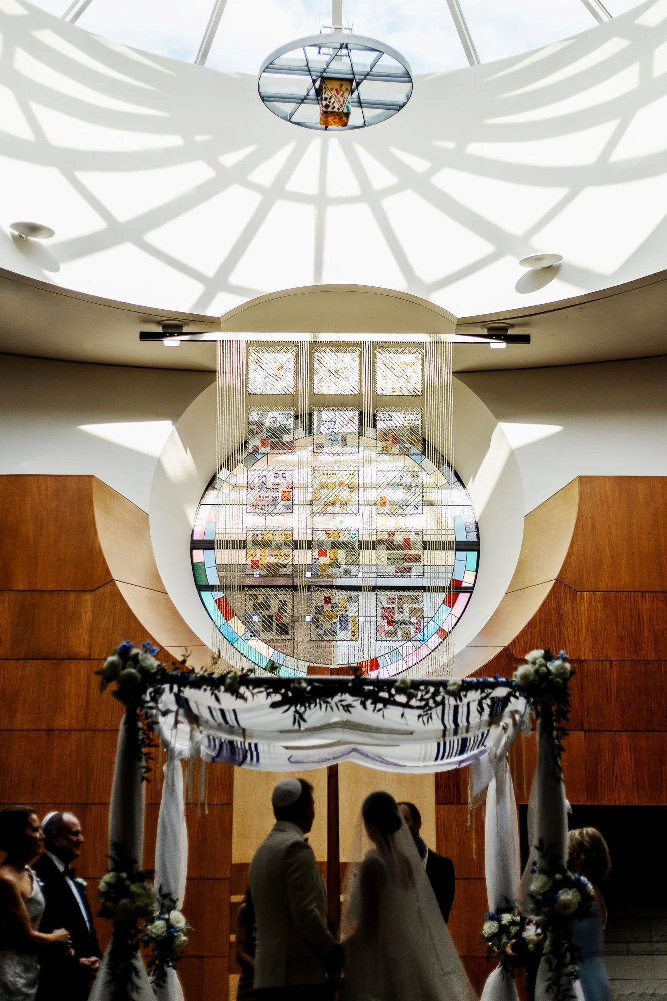 Sarah and Owen during their Jewish wedding ceremony at Temple Shir Shalom