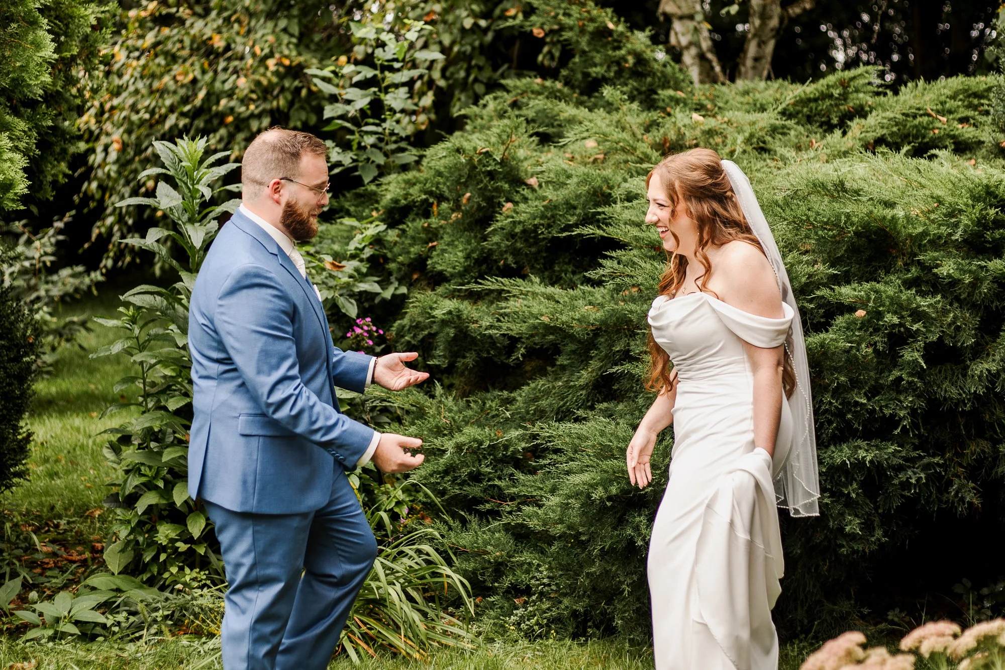 Groom approaching bride with a tearful embrace after seeing her for the first time on their wedding day at Bloom and Bower in Risingsun, Ohio