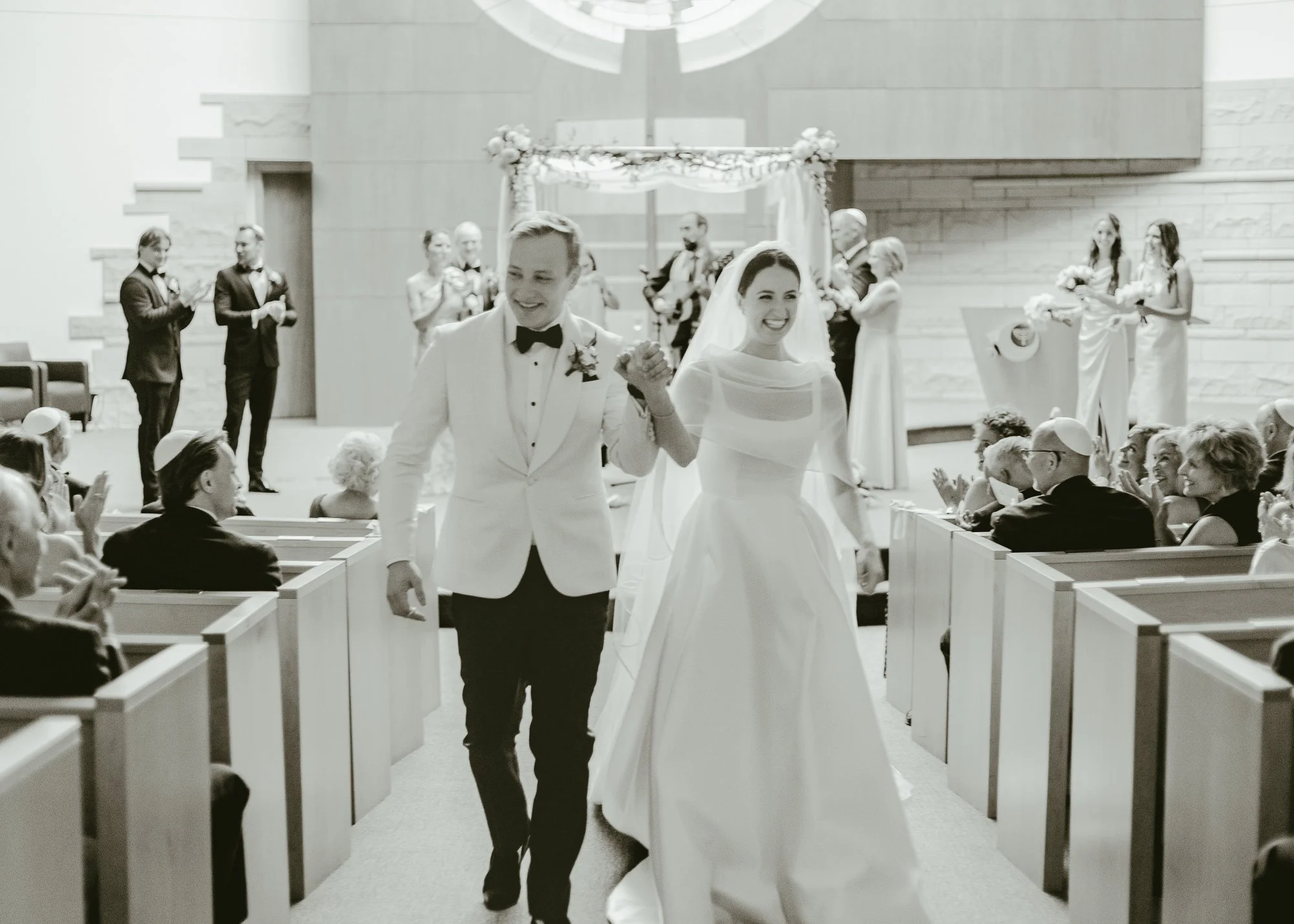 Sarah and Owen recessional in the Temple Shir Shalom sanctuary