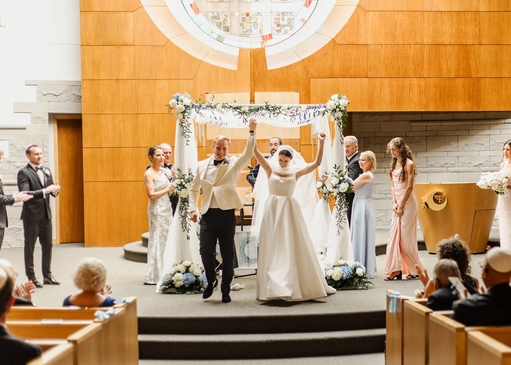 Sarah and Owen during their Jewish wedding ceremony at Temple Shir Shalom