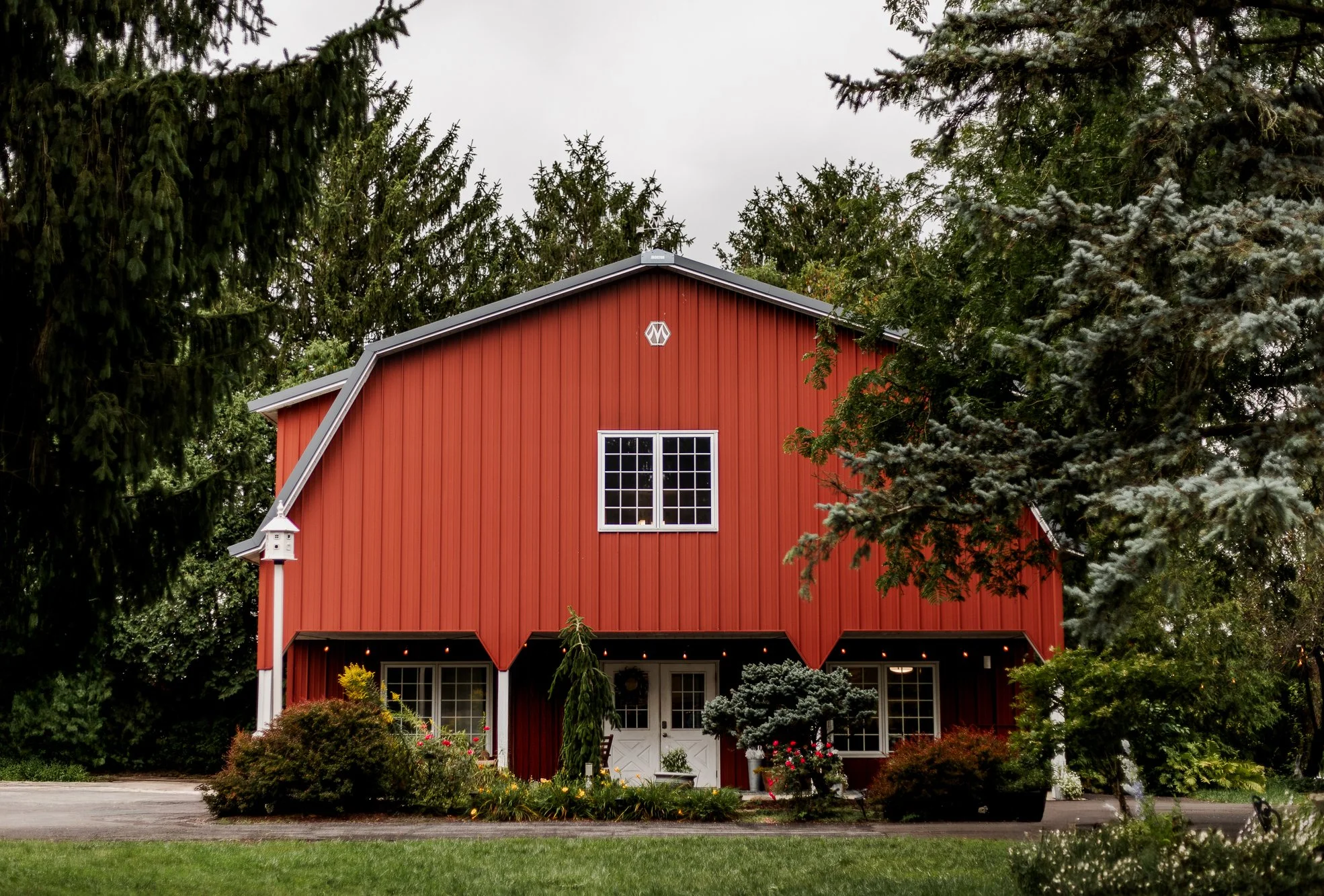 Red bread and breakfast barn on a cloudy day at Bloom and Bower in Risingsun, Ohio