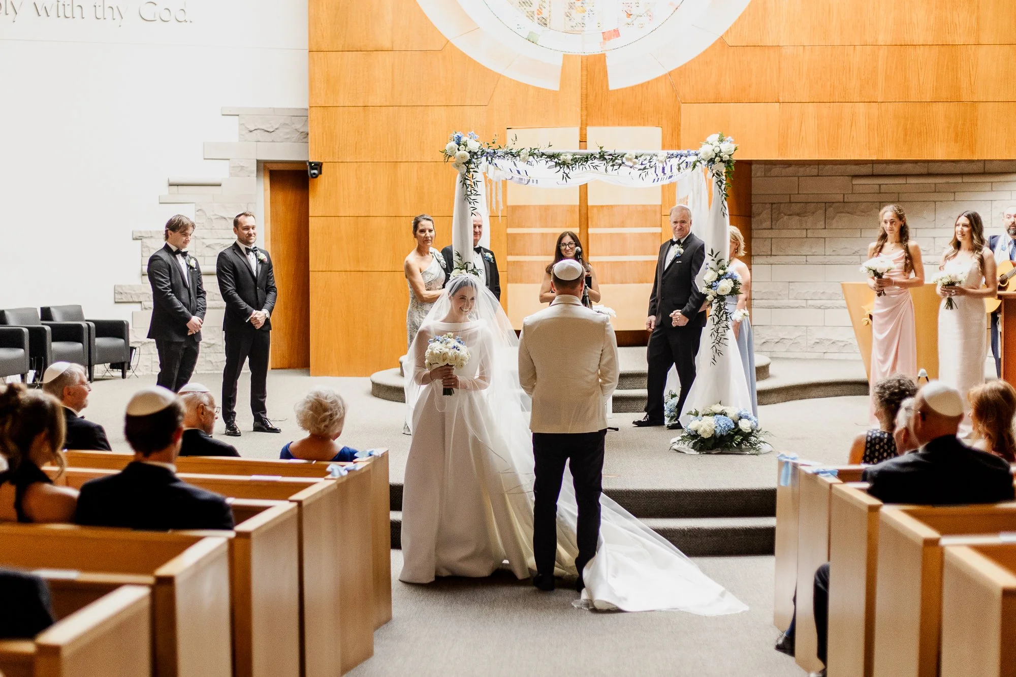 Sarah and Owen during their Jewish wedding ceremony at Temple Shir Shalom