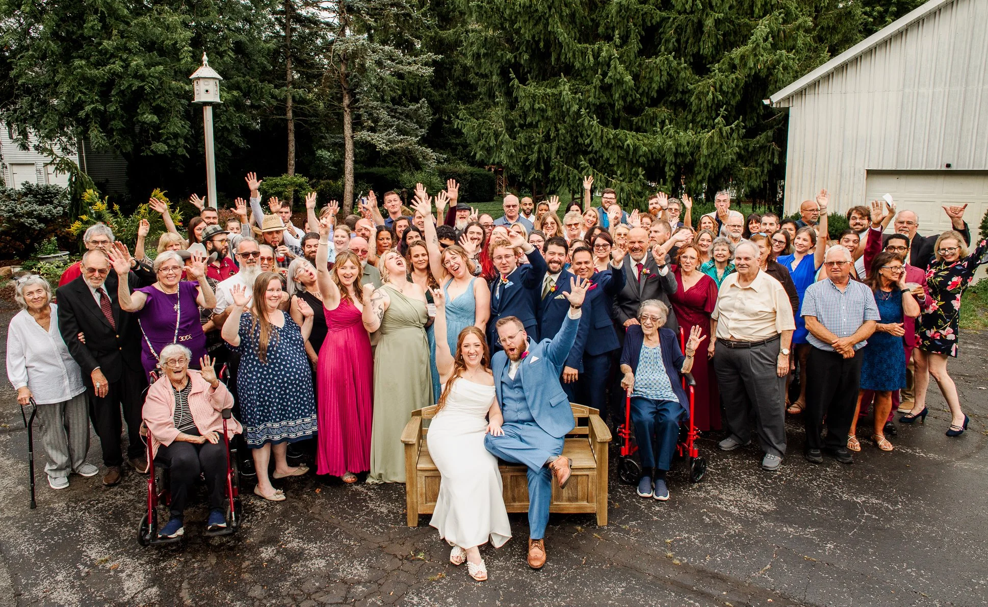 wide shot of all wedding guests at september wedding at bloom and bower in rising sun ohio