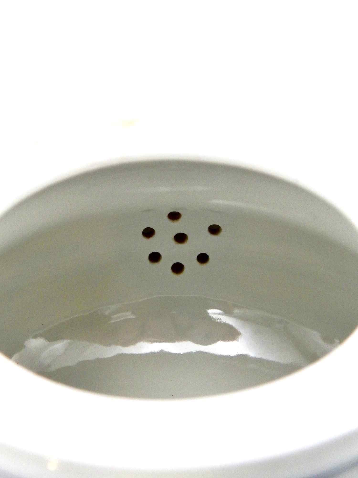 blue-onion-crossed-sword-meissen-teapot-strainer.jpg