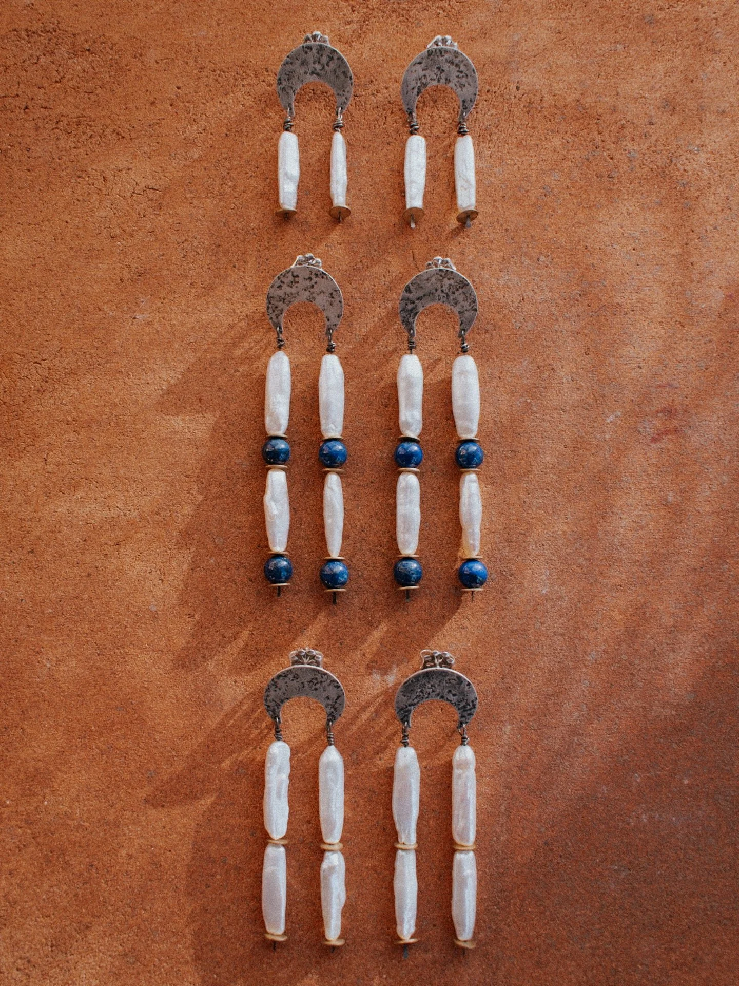 These 6 sets of pearl lovelies are hitting my website Thursday evening, and will be my last formal shop update for the year. 
I do have other new pieces in the works to bring with me to Renegade Craft Fair this weekend, and am toying with the idea of