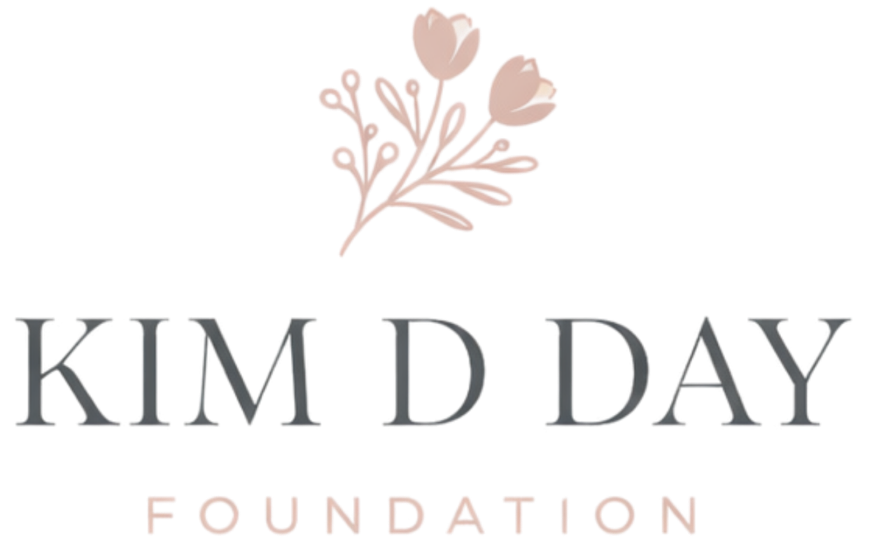 Kim D. Day Foundation logo featuring a beige flower with three buds above the name, which is written in large, bold, gray and navy blue letters, and the words 'Foundation' underneath in smaller pink capital letters.