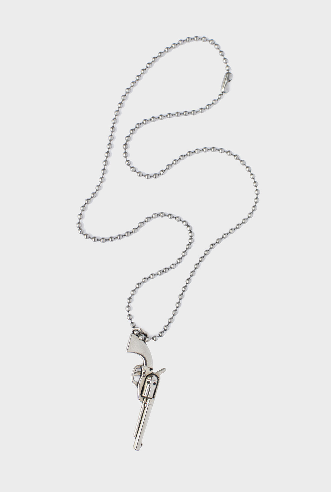 SIX SHOOTER GUN NECKLACE