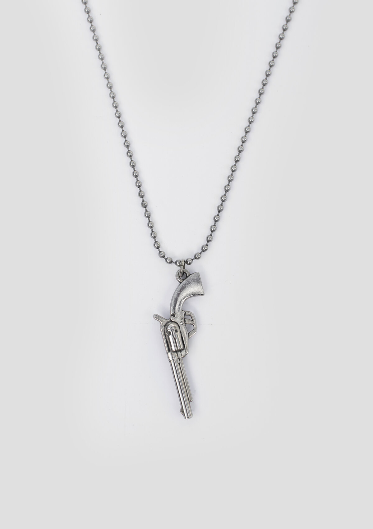 SIX SHOOTER GUN NECKLACE